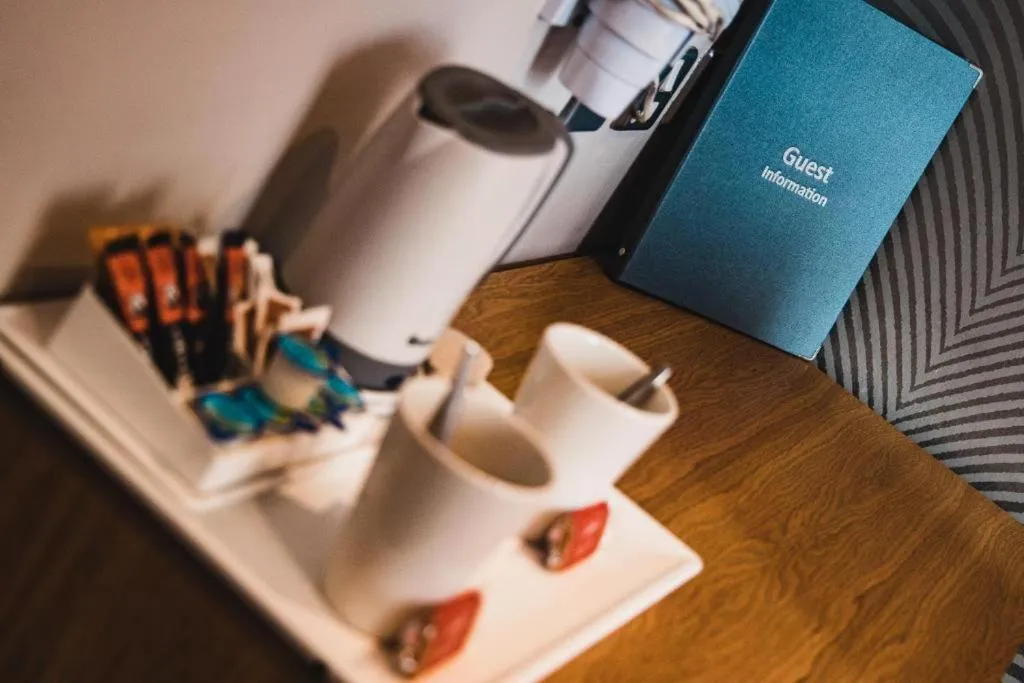 Bedroom in OYO The Red Lion Hotel