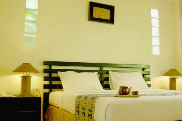Bed in River Resort & Spa
