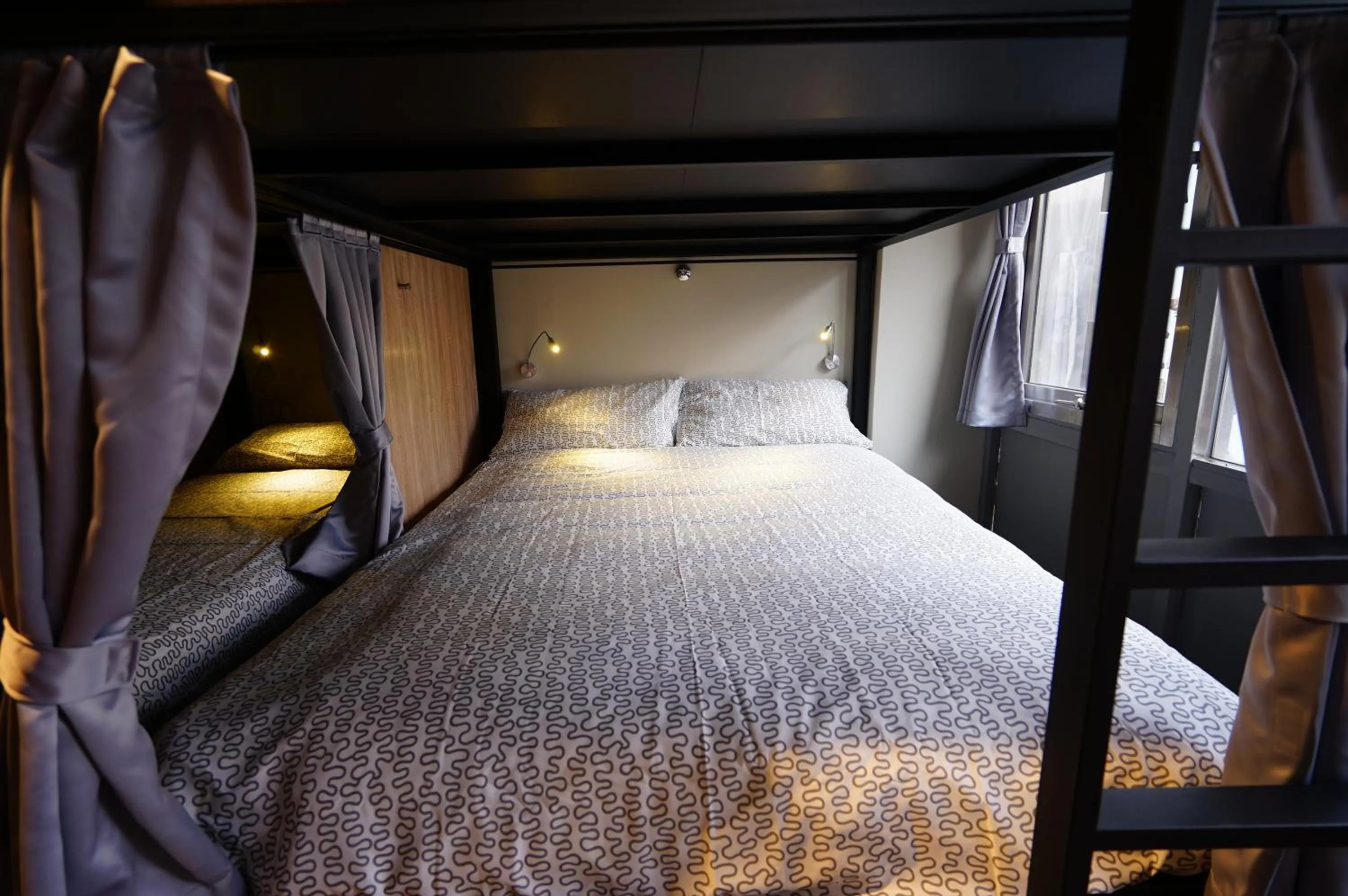 Photo of the whole room, Bed in Cavemen Hostel Taipei Station Youth Branch