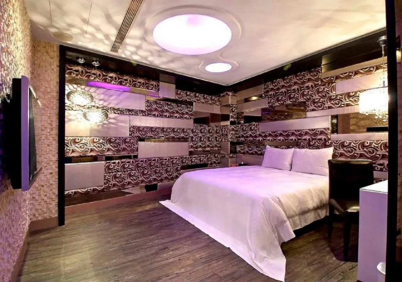 Photo of the whole room, Bed in Feng Cai Motel