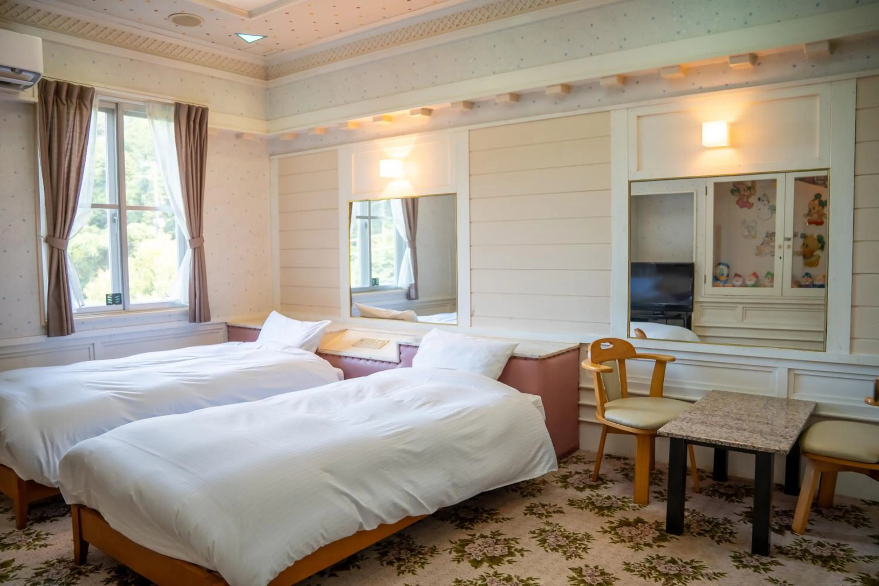 Bed in Farm Garden Hotel