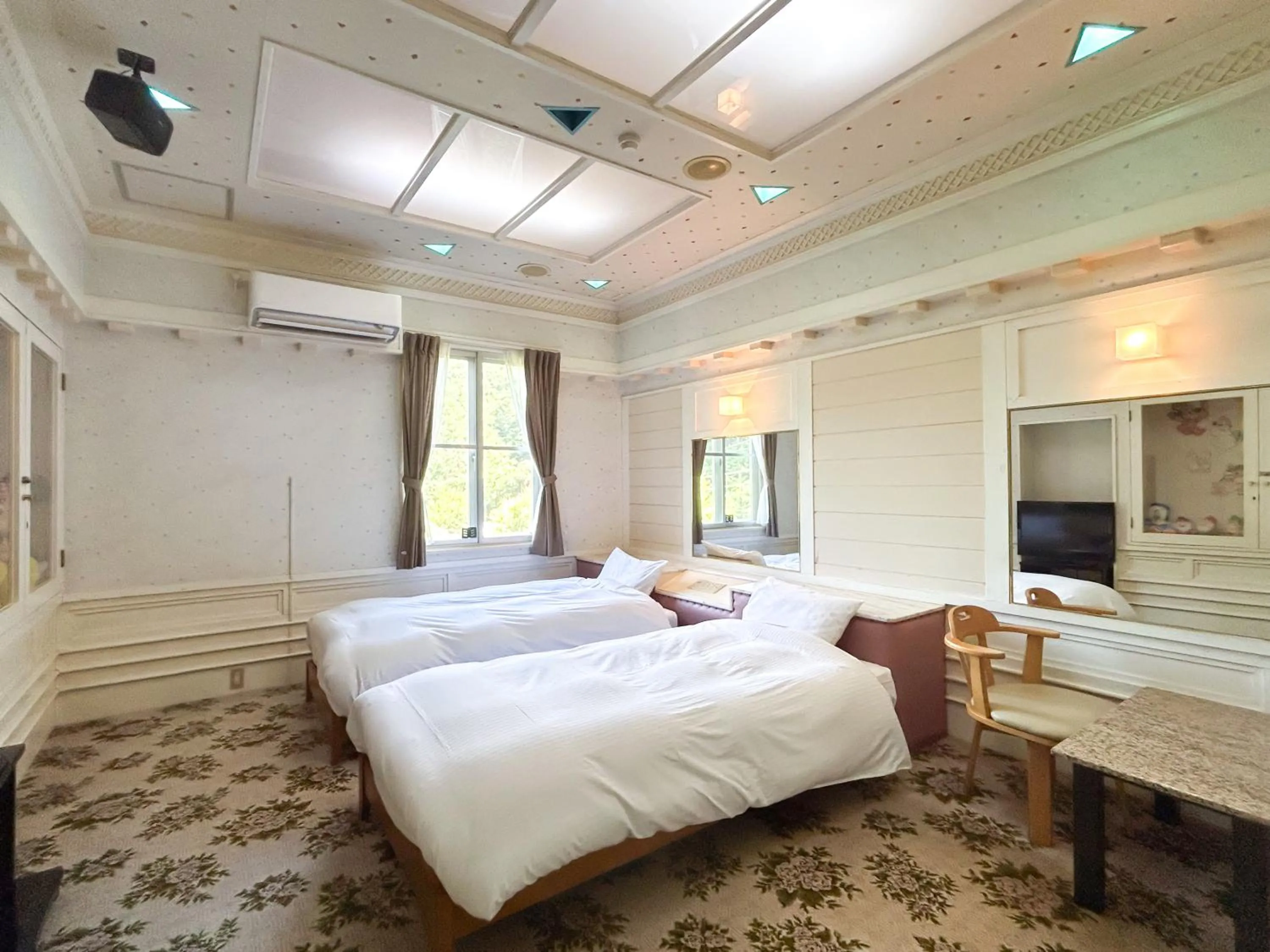 Bed in Farm Garden Hotel