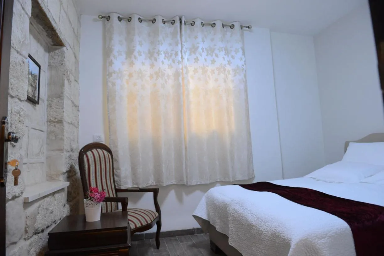 Photo of the whole room, Bed in Mensa Christi Guesthouse
