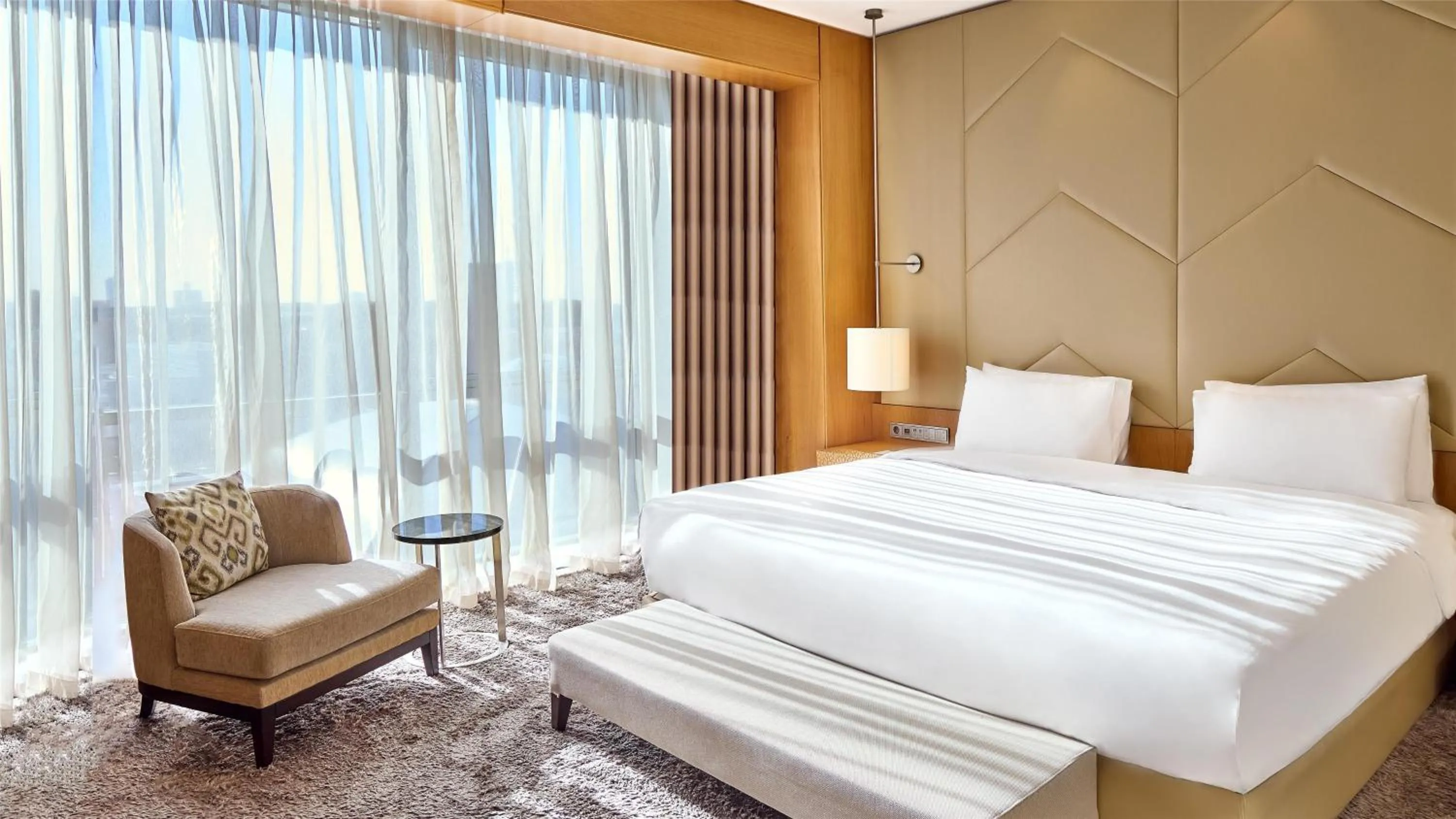 Photo of the whole room, Bed in Hyatt Regency Tashkent