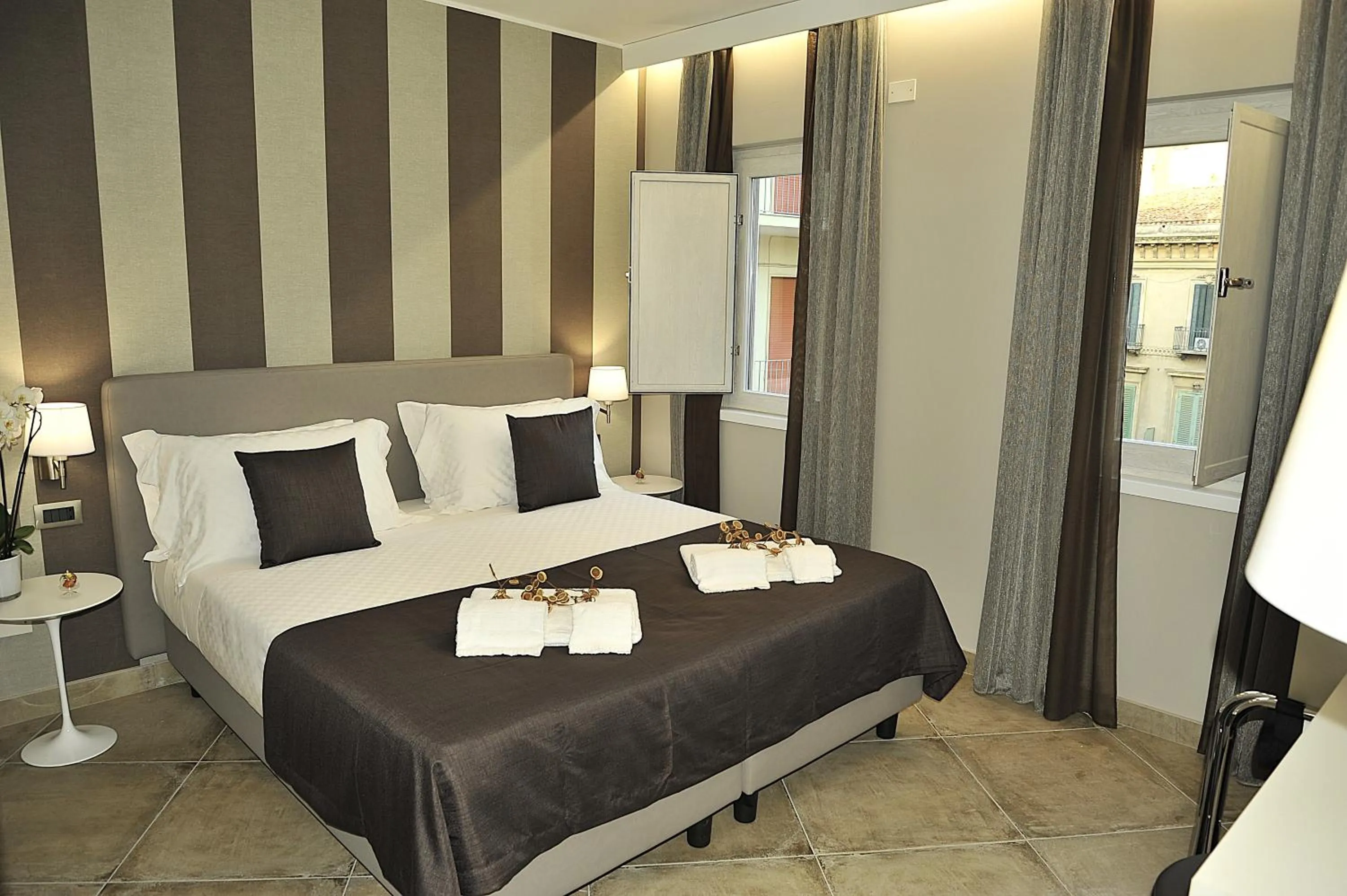 Bed in ETNEA 454 Catania Luxury Rooms