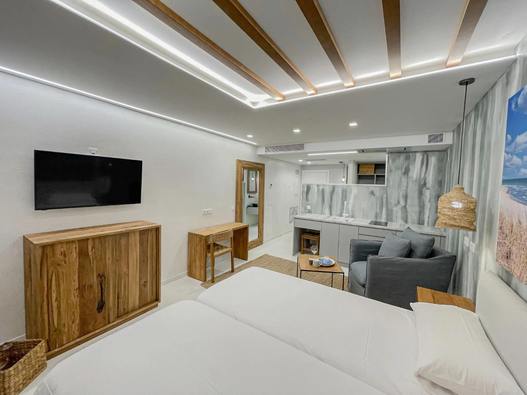 Communal lounge/ TV room, Bed in Gran Marina Suites