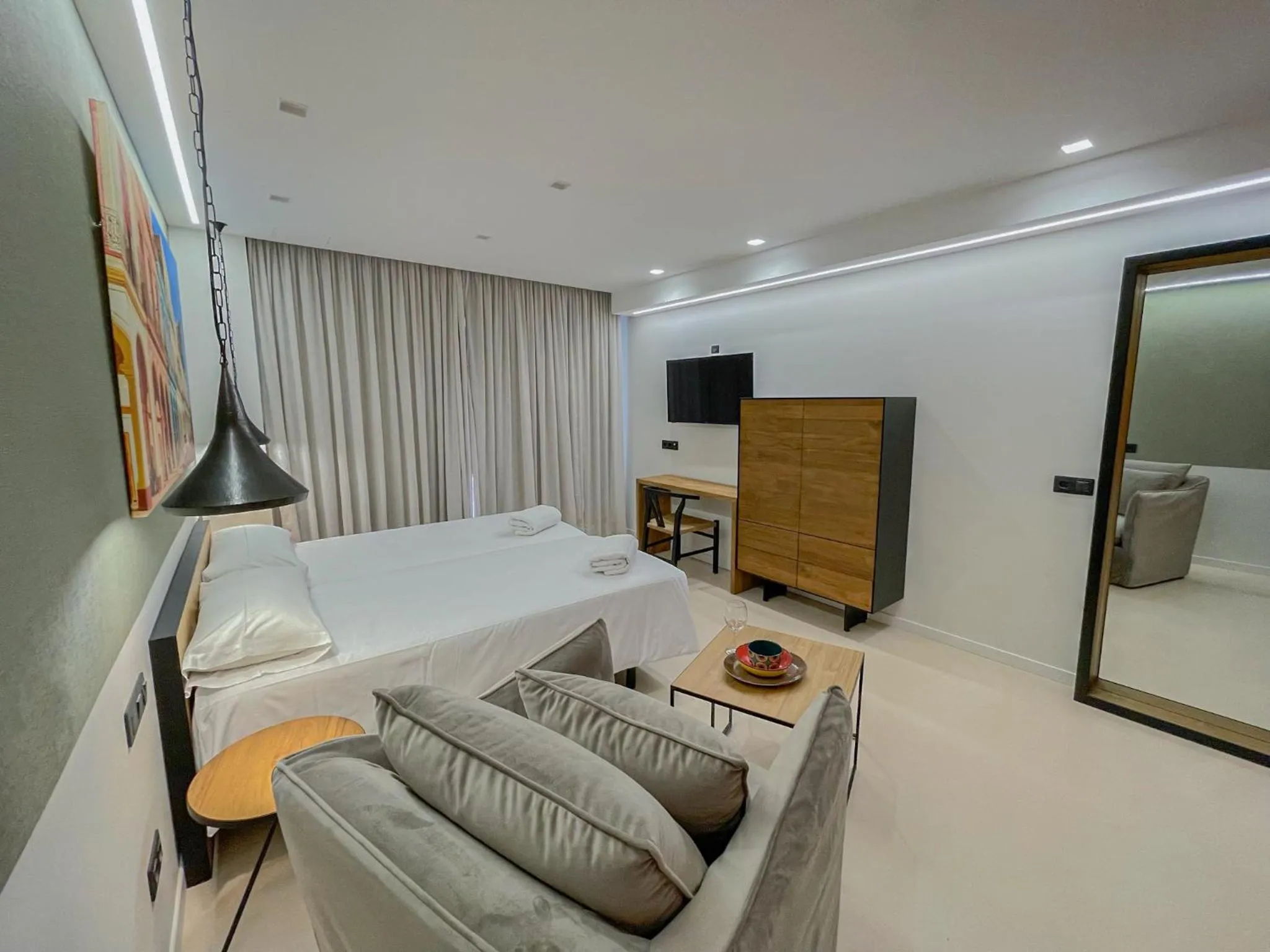 Bed in Gran Marina Suites