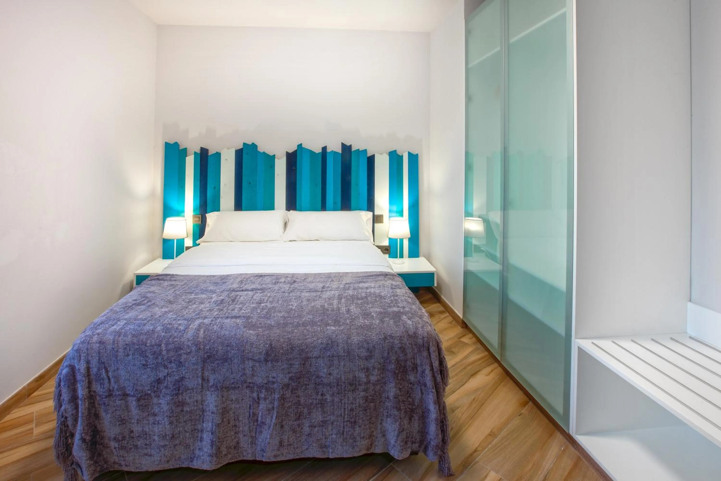 Bed in Gran Marina Suites