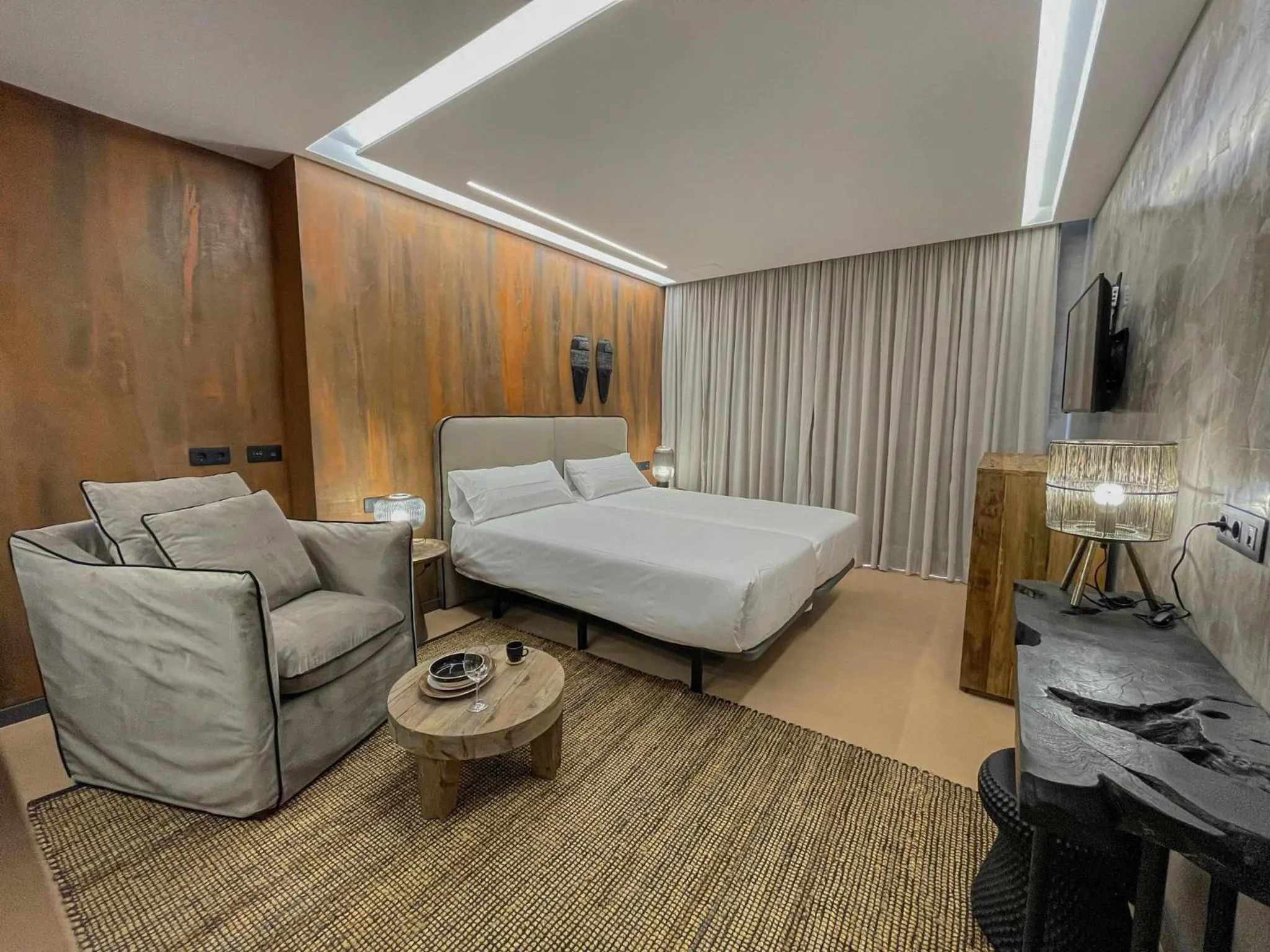 Bed in Gran Marina Suites