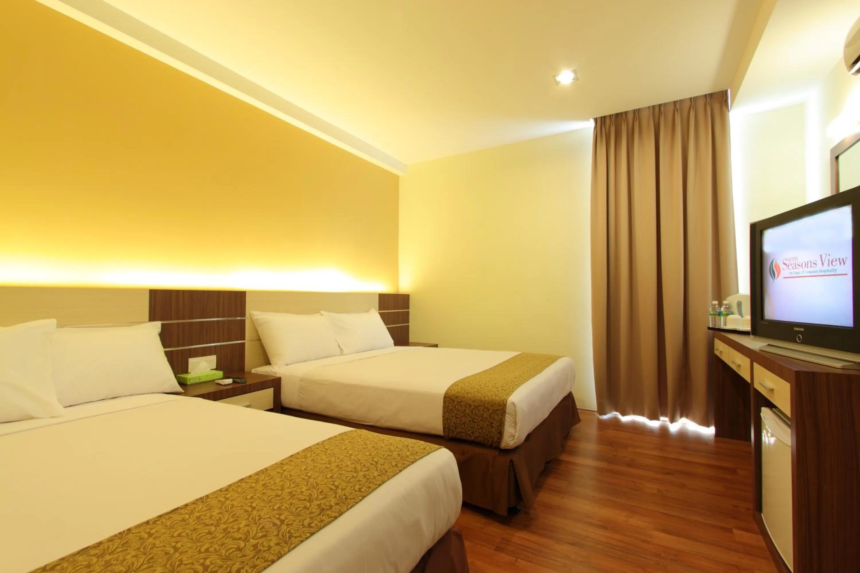 Bed in Seasons View Hotel