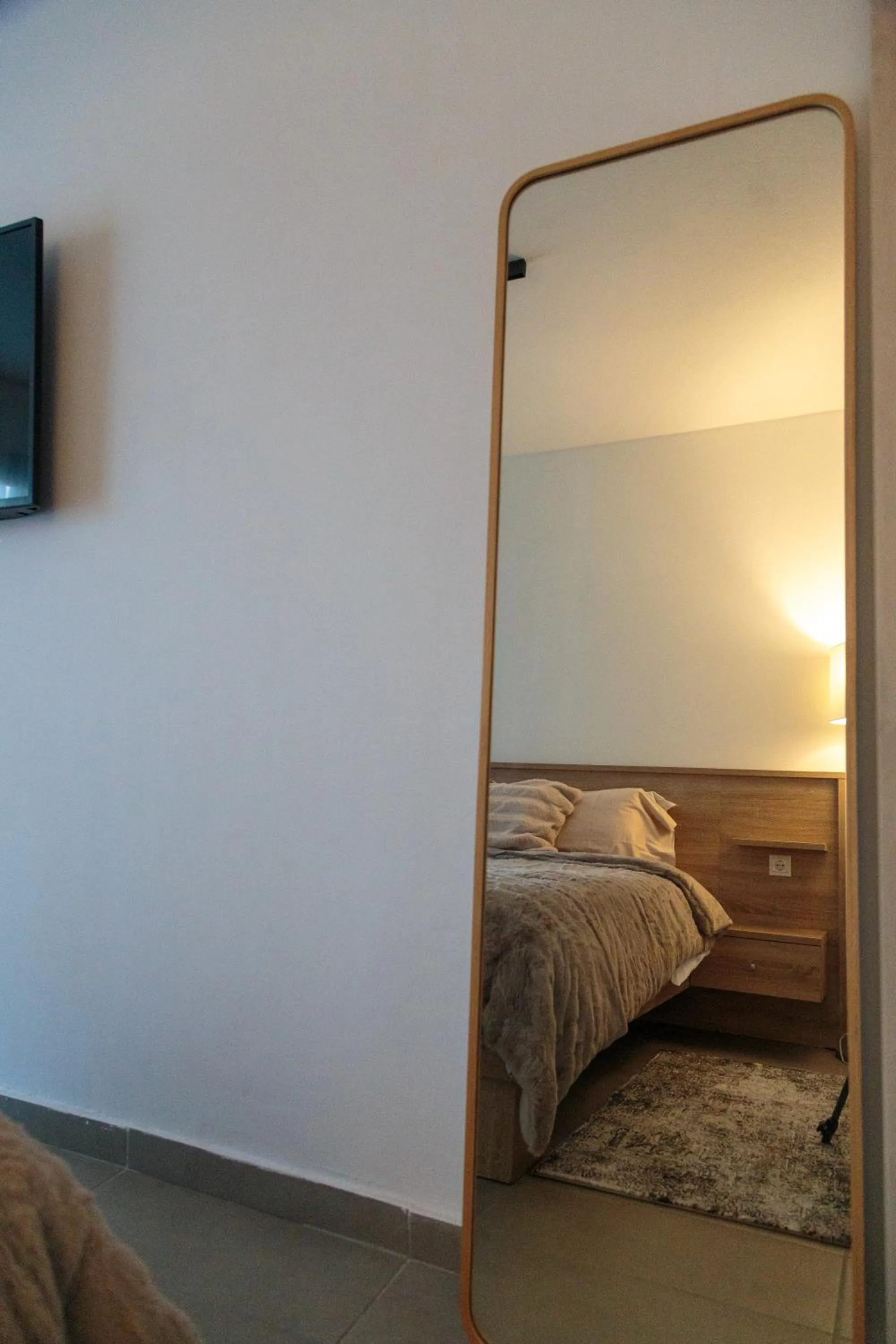 Bed in Limani Comfort Rooms