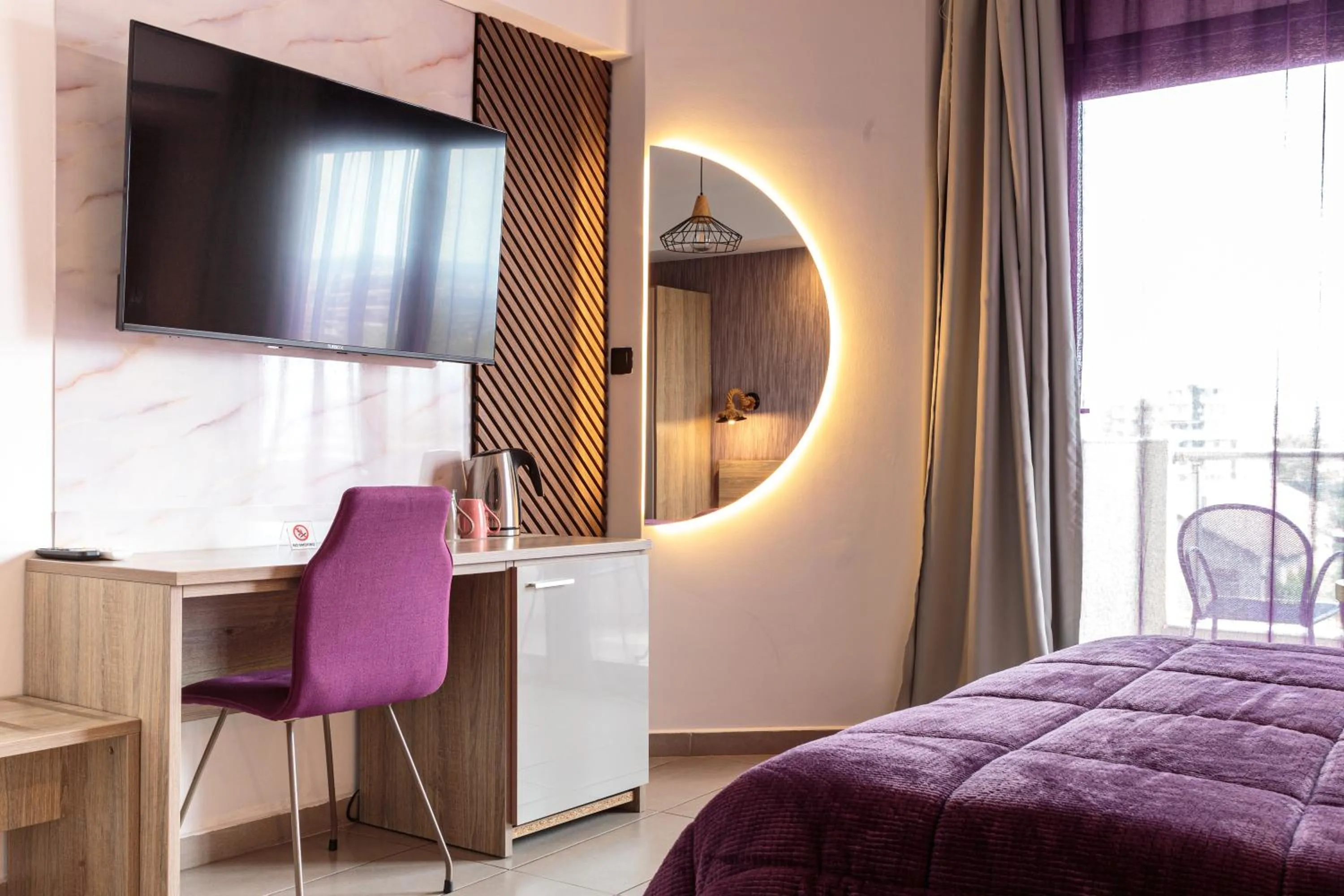 Bed in Limani Comfort Rooms