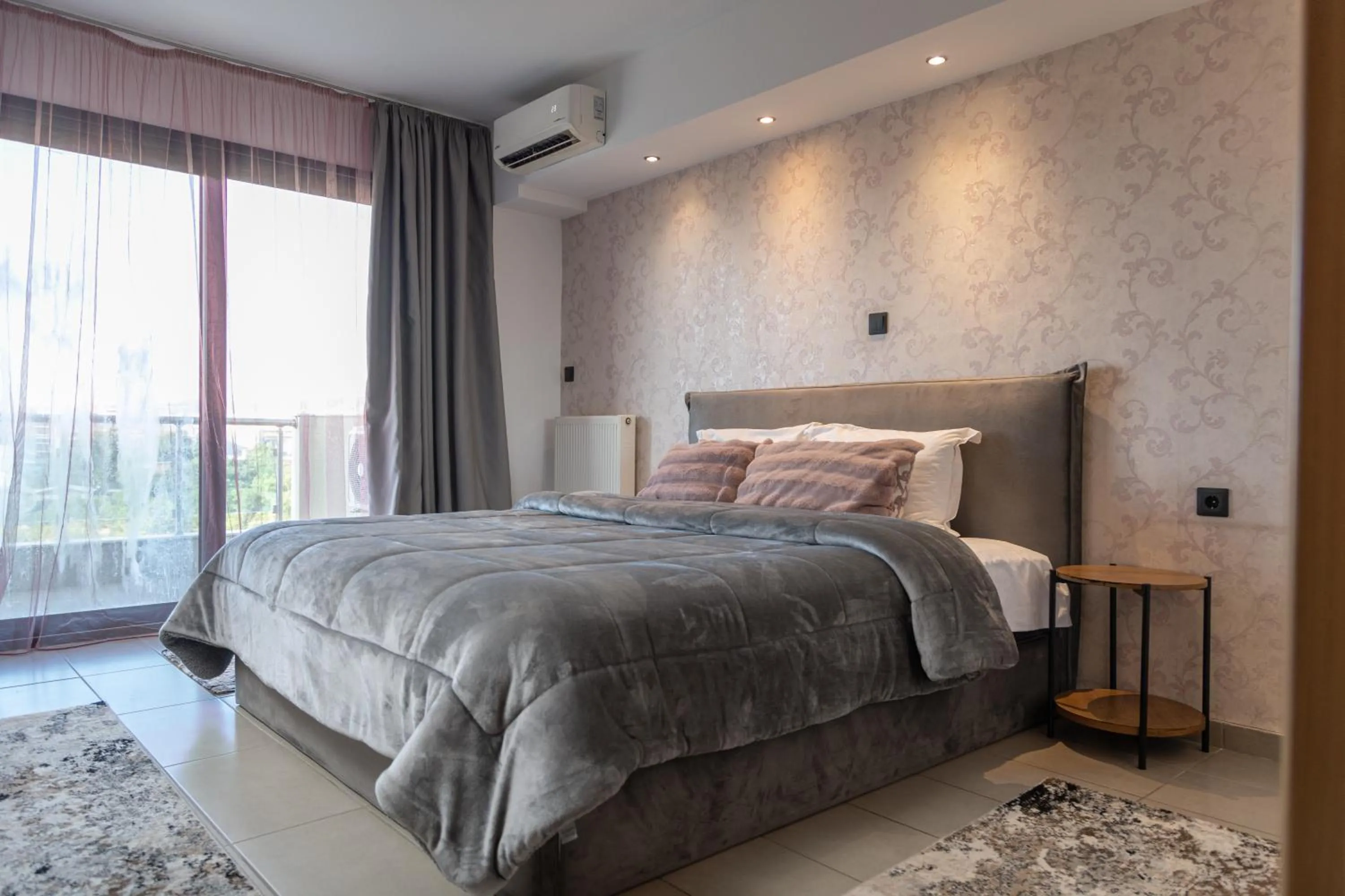 Bed in Limani Comfort Rooms