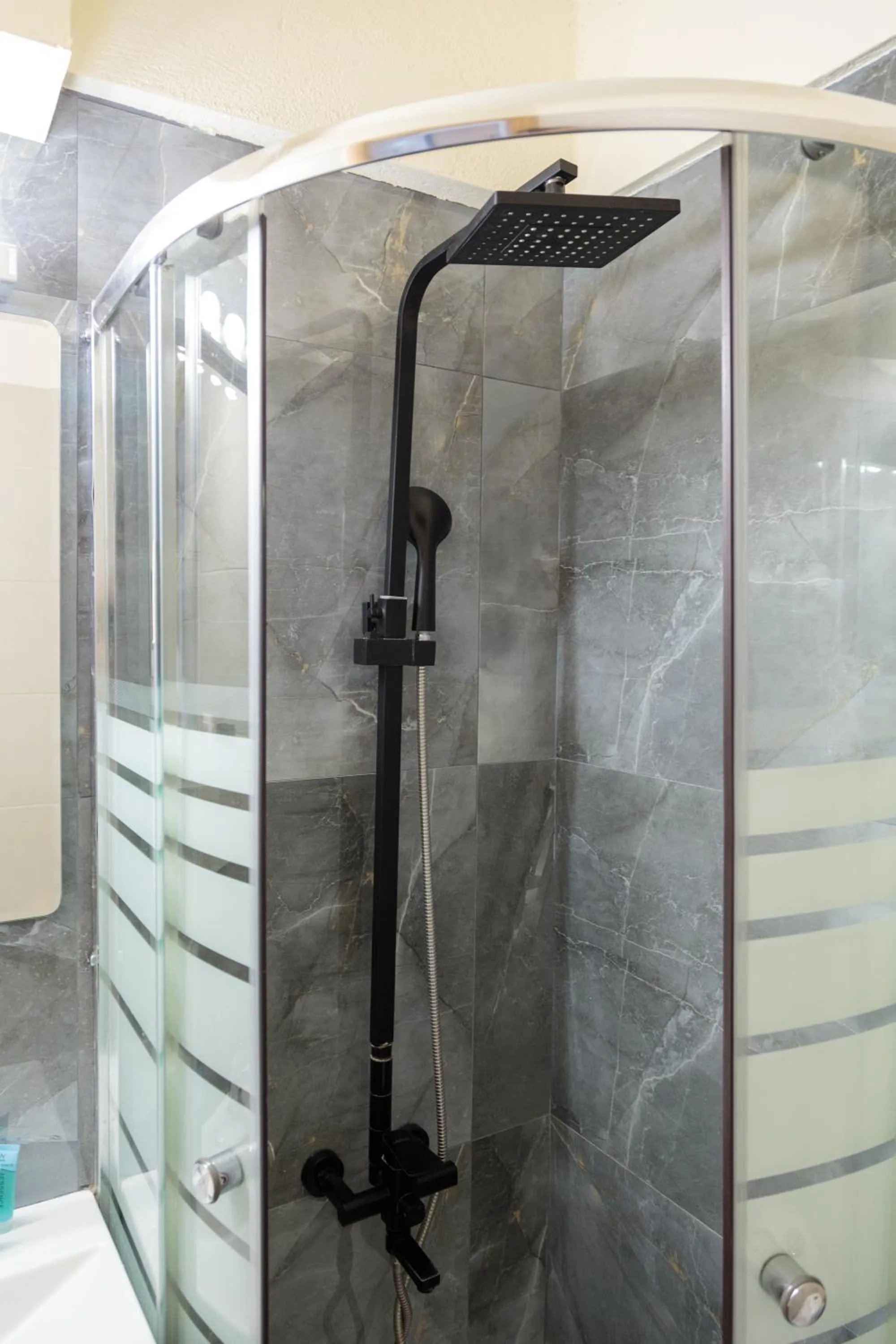 Shower in Limani Comfort Rooms