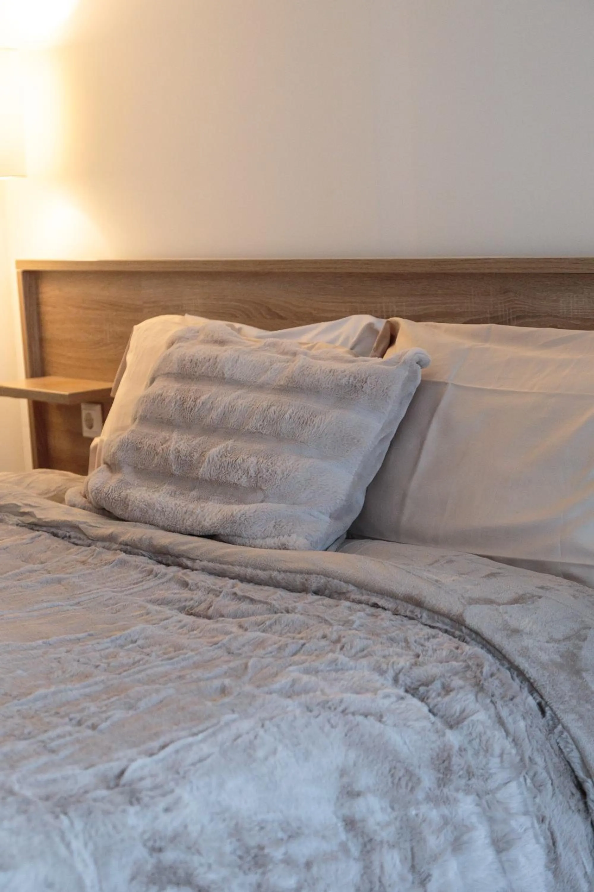 Bed in Limani Comfort Rooms