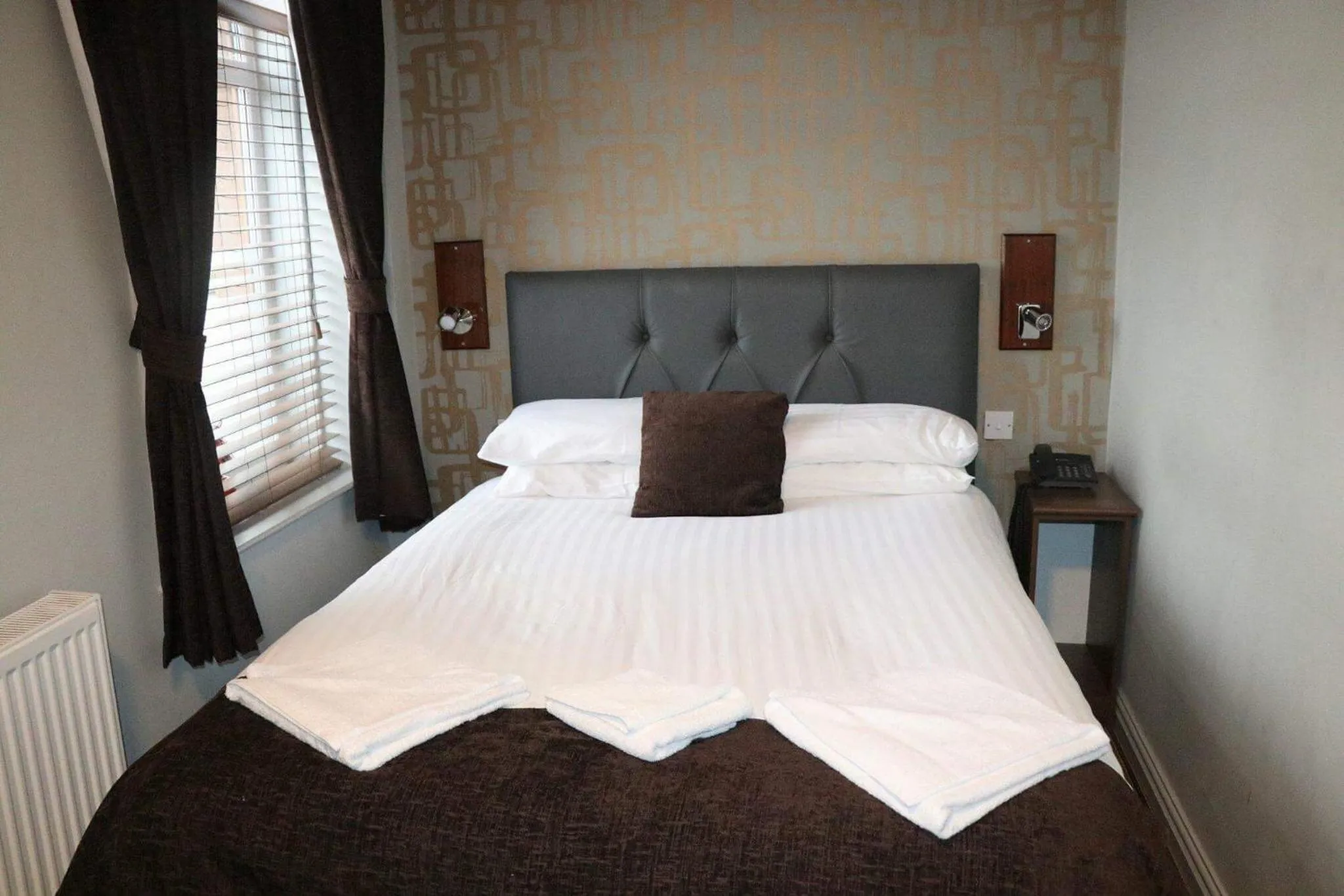 Bed in The Griffin Inn