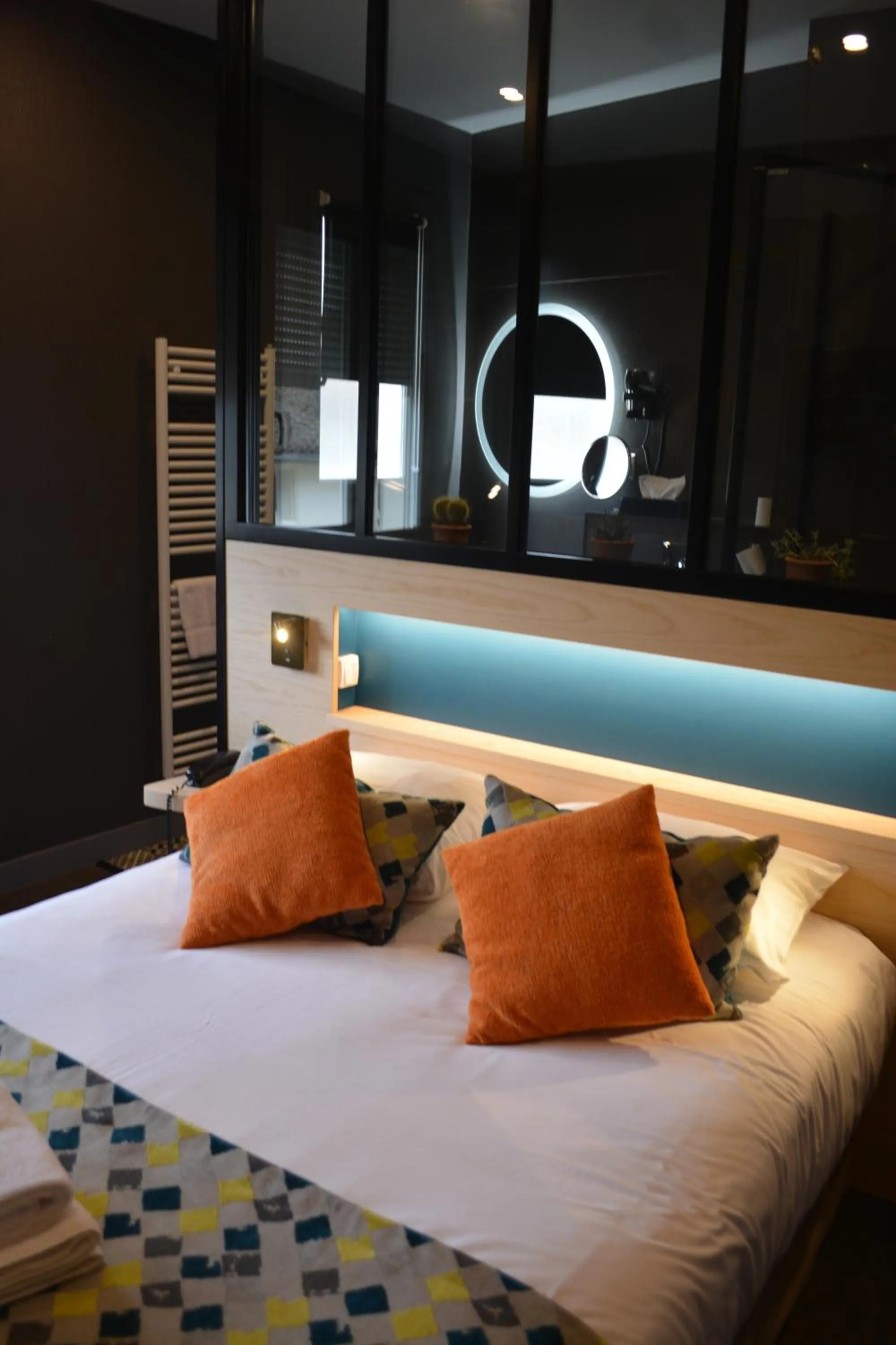 Bed in Logis hotels Les Glycines