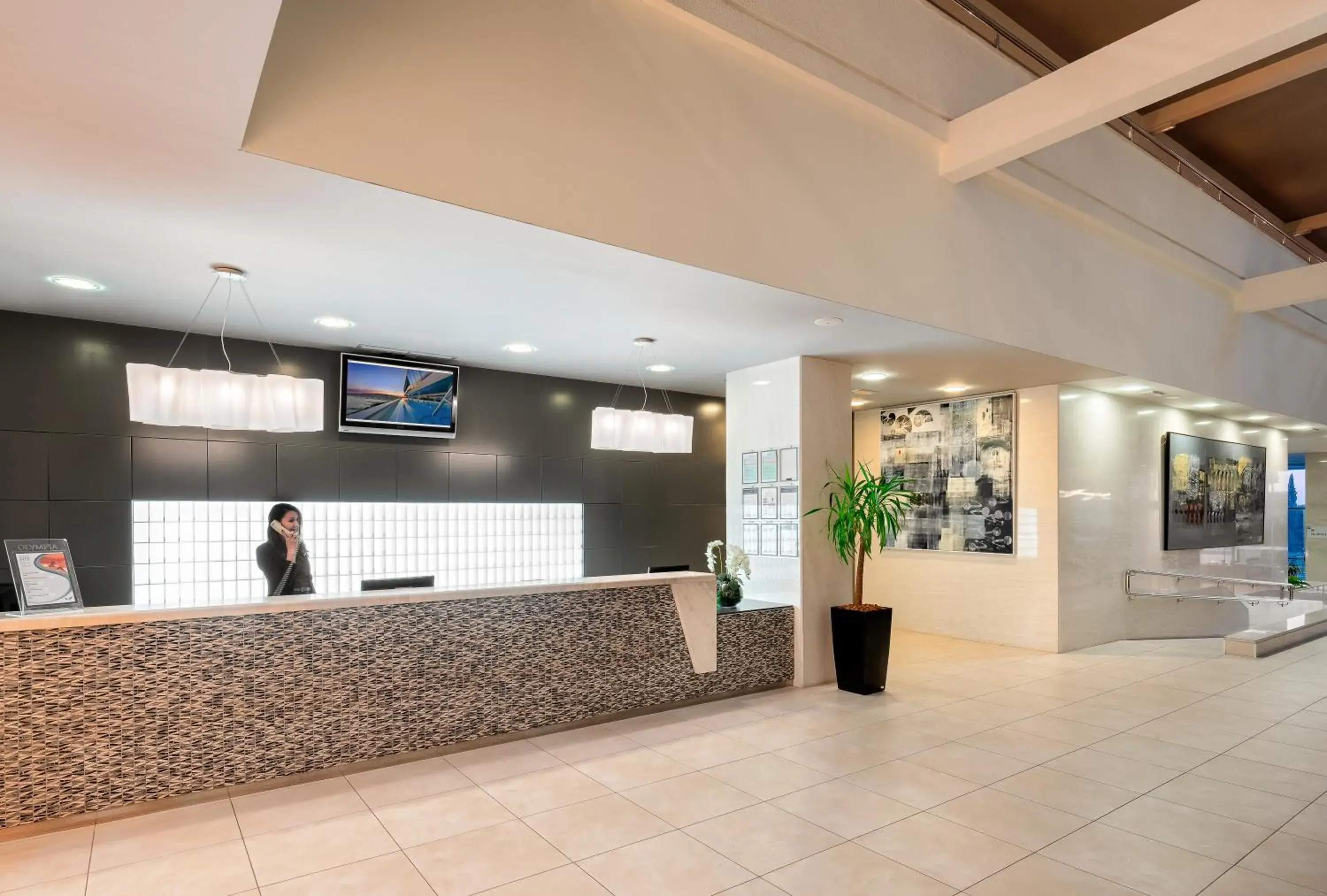 Lobby or reception in Hotel Olympia Lobby or reception in Hotel Olympia