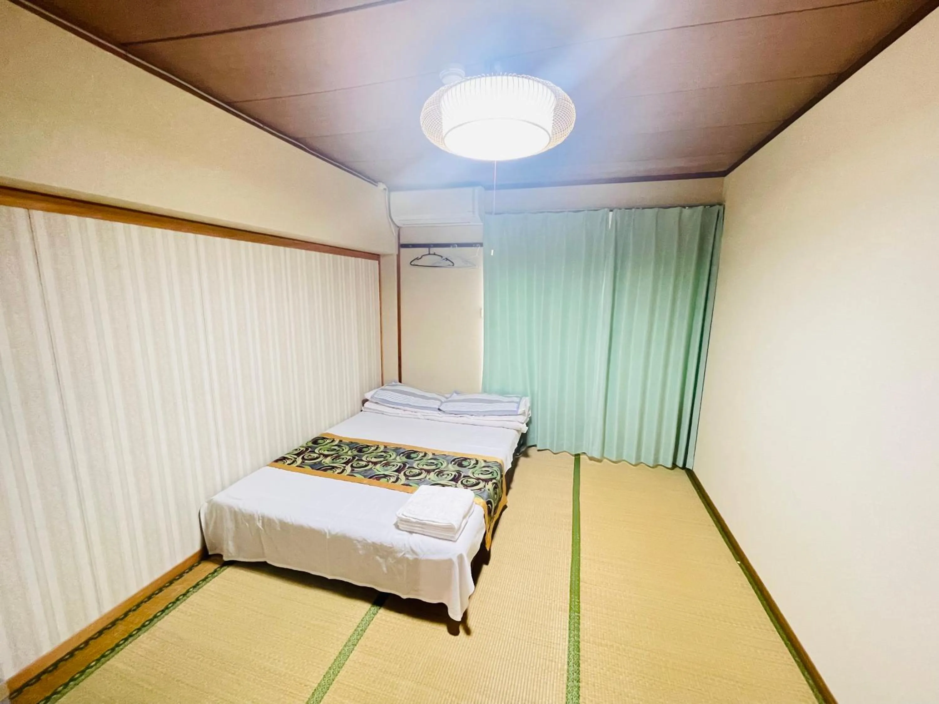 Bed in Shiga Biwa Lake Shanshui House