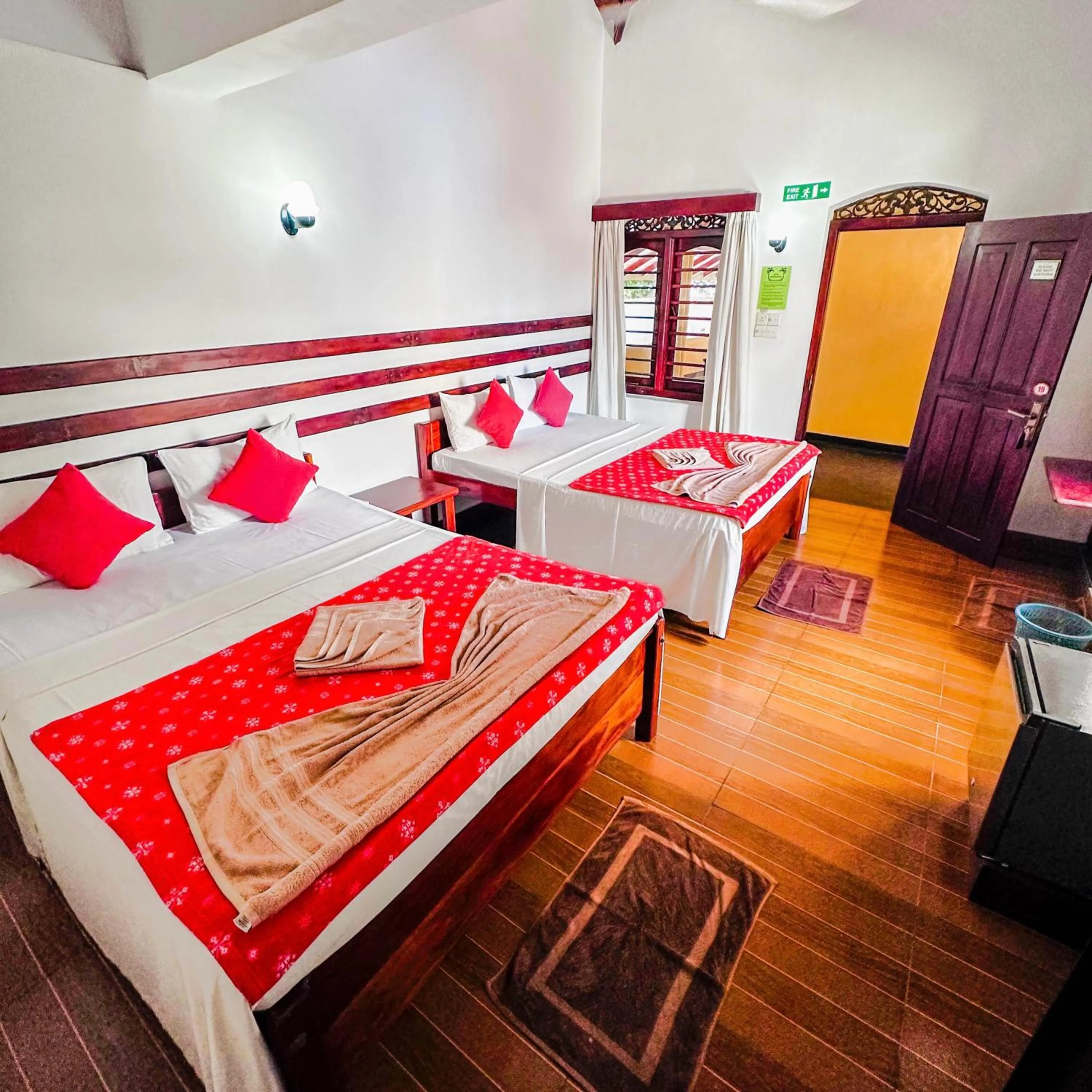 Bed in Drifters Hotel & Beach Restaurant