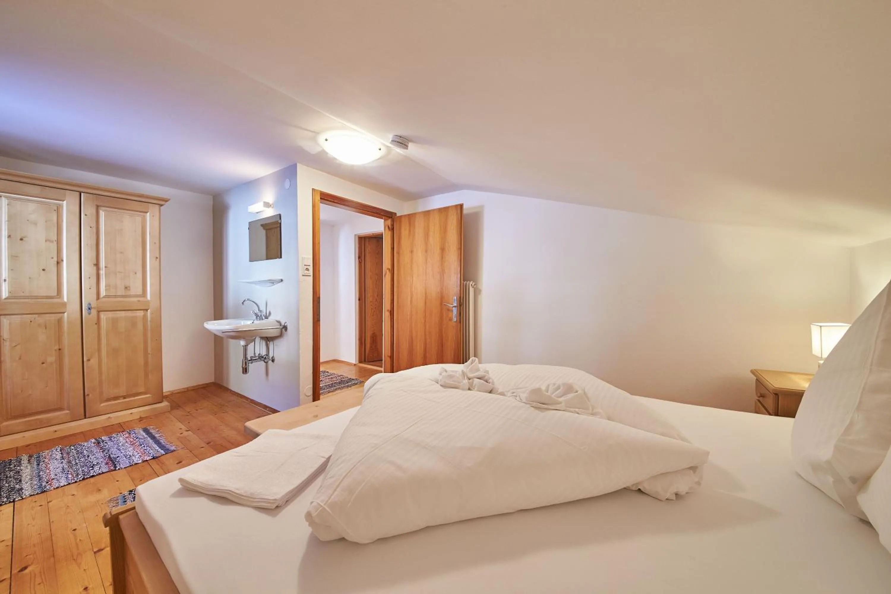 Bed in Ferienhaus Oberlengau