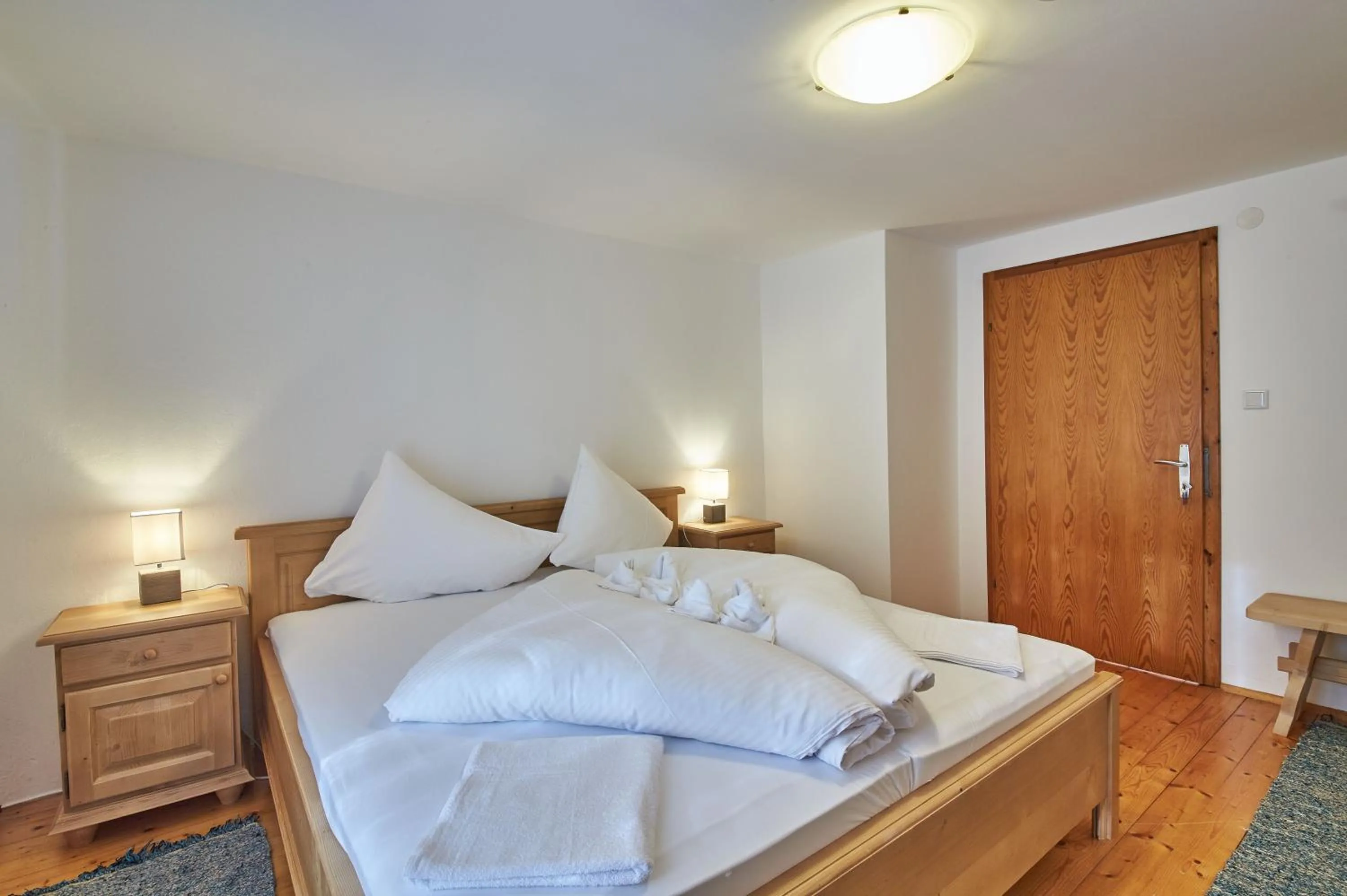 Bed in Ferienhaus Oberlengau