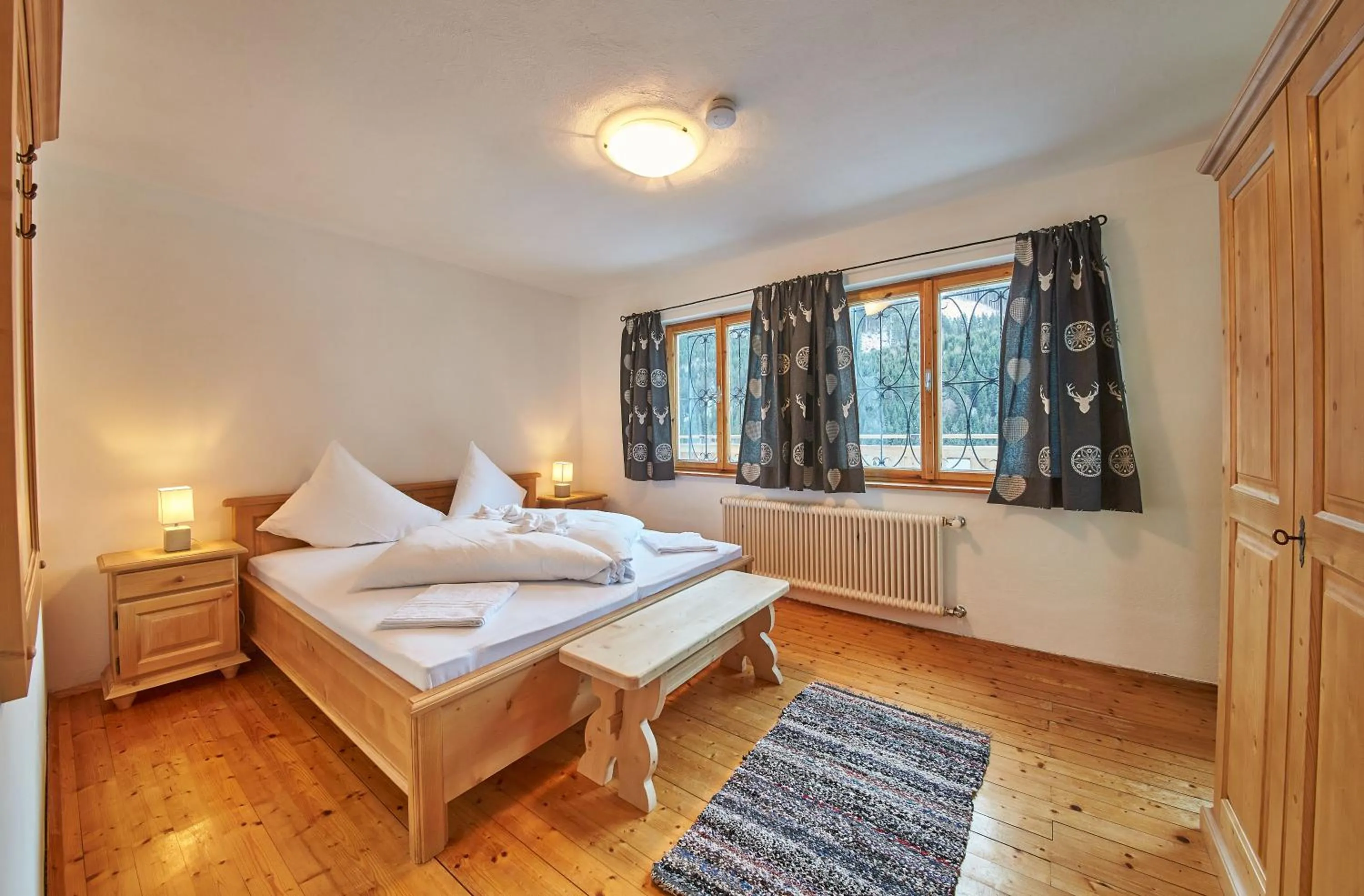 Bed in Ferienhaus Oberlengau