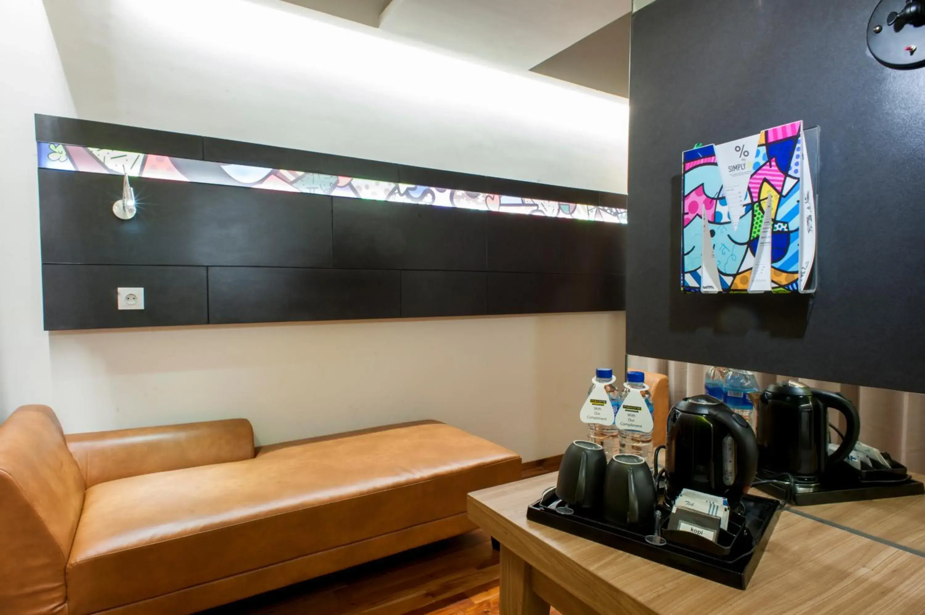 Living room in MaxOneHotels at Dharmahusada Surabaya Living room in MaxOneHotels at Dharmahusada Surabaya