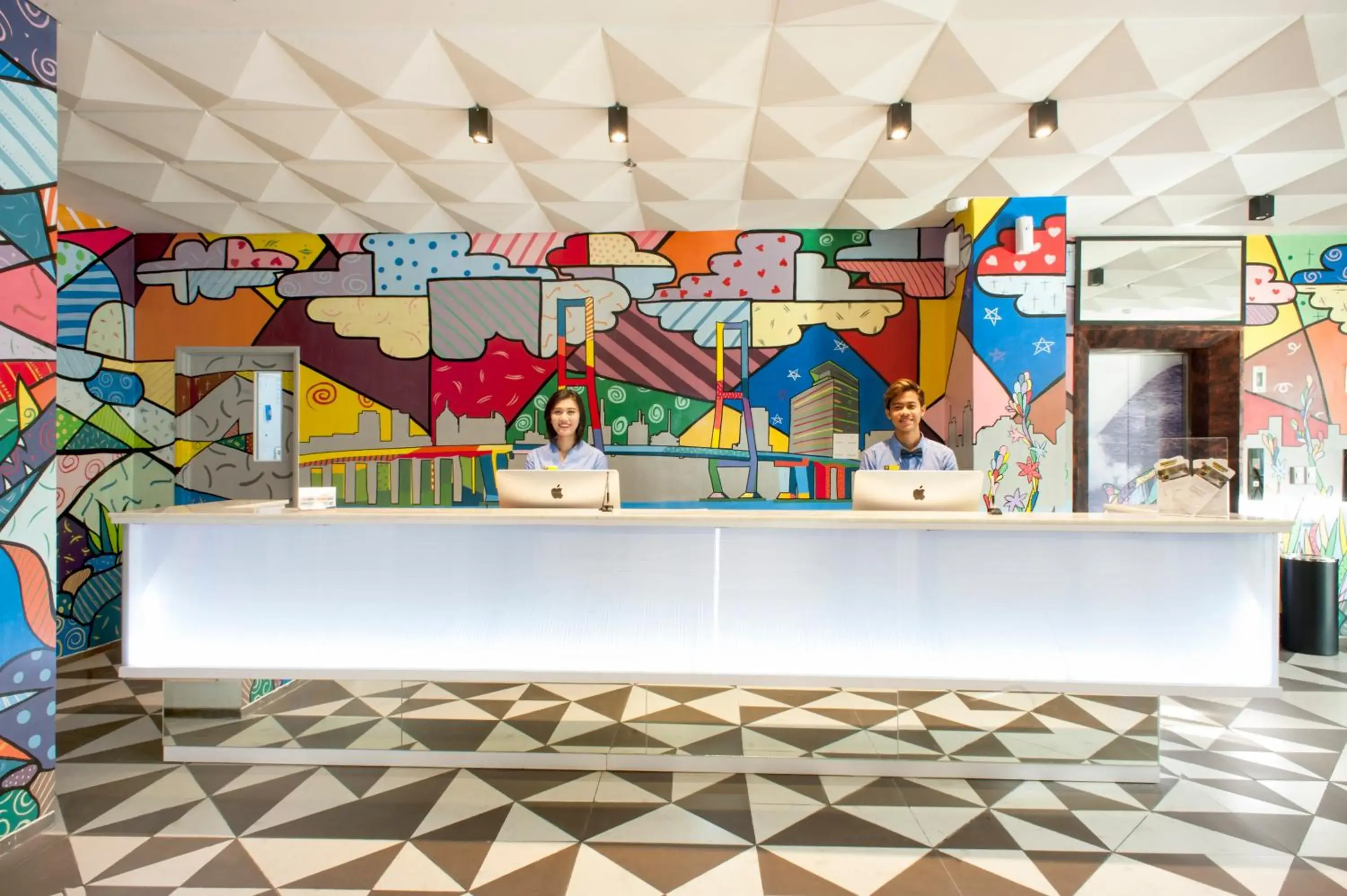 Lobby or reception in MaxOneHotels at Dharmahusada Surabaya Lobby or reception in MaxOneHotels at Dharmahusada Surabaya
