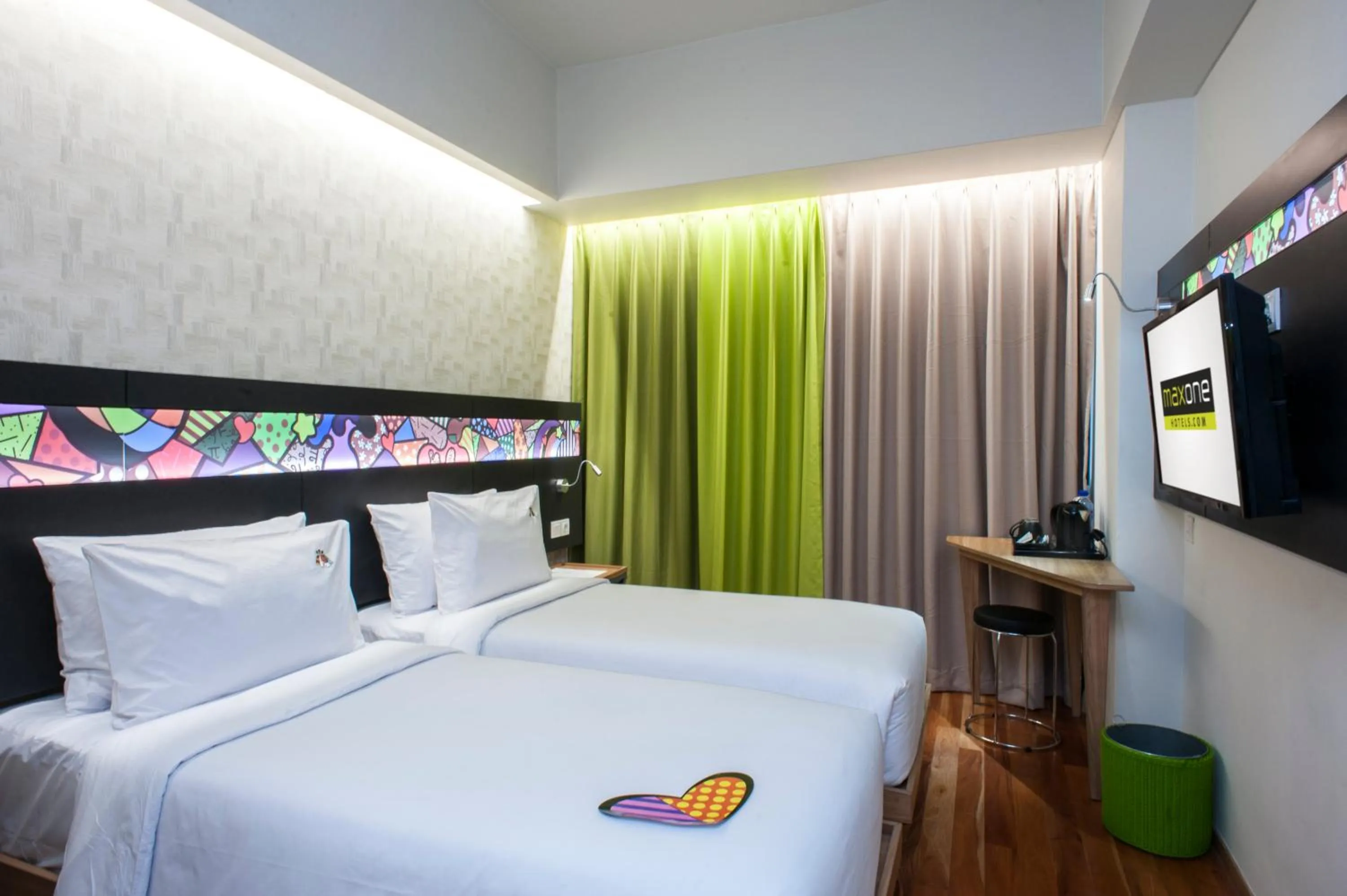 TV and multimedia, Bed in MaxOneHotels at Dharmahusada Surabaya