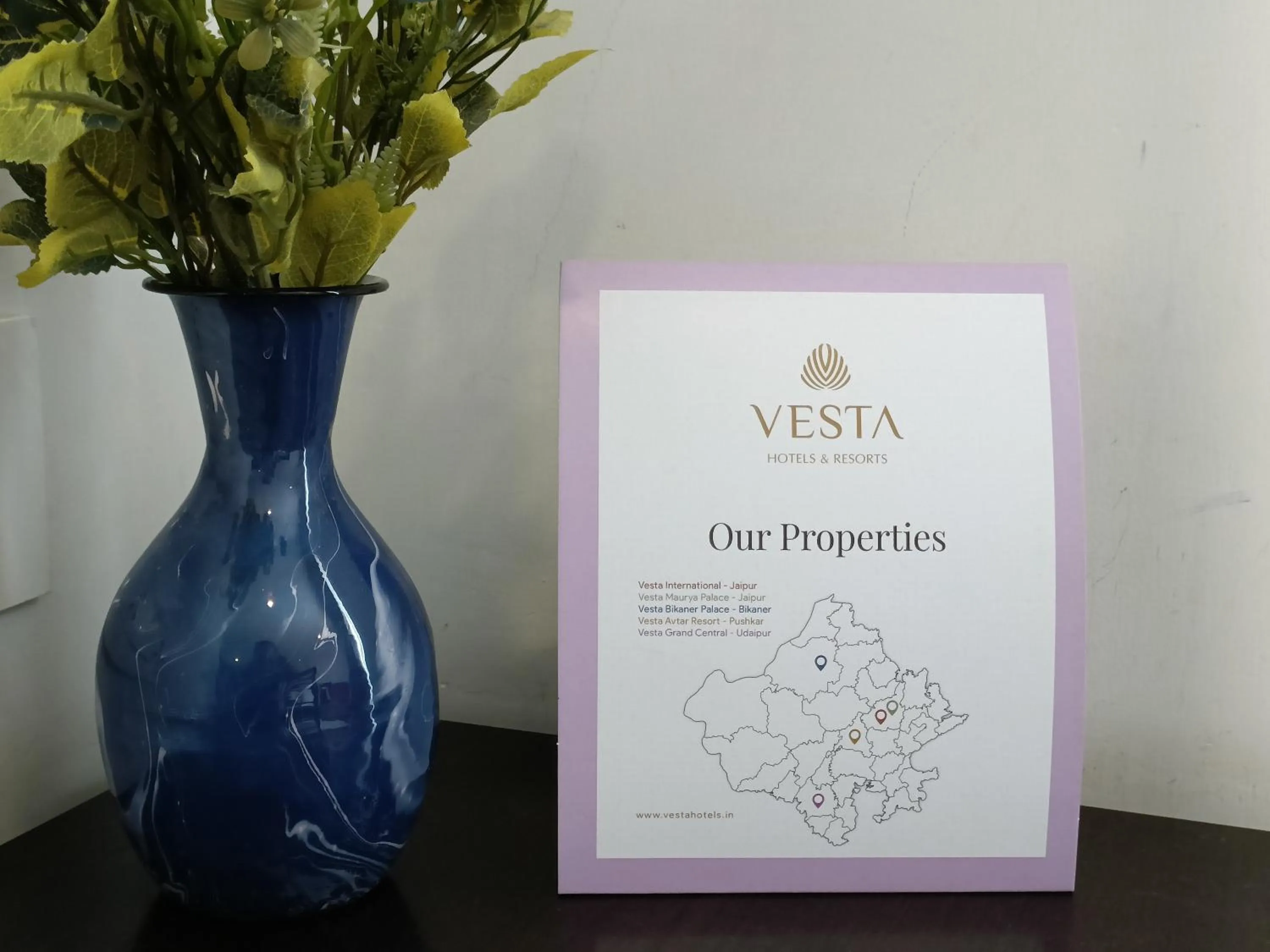 Property logo or sign in Hotel Mumbai House