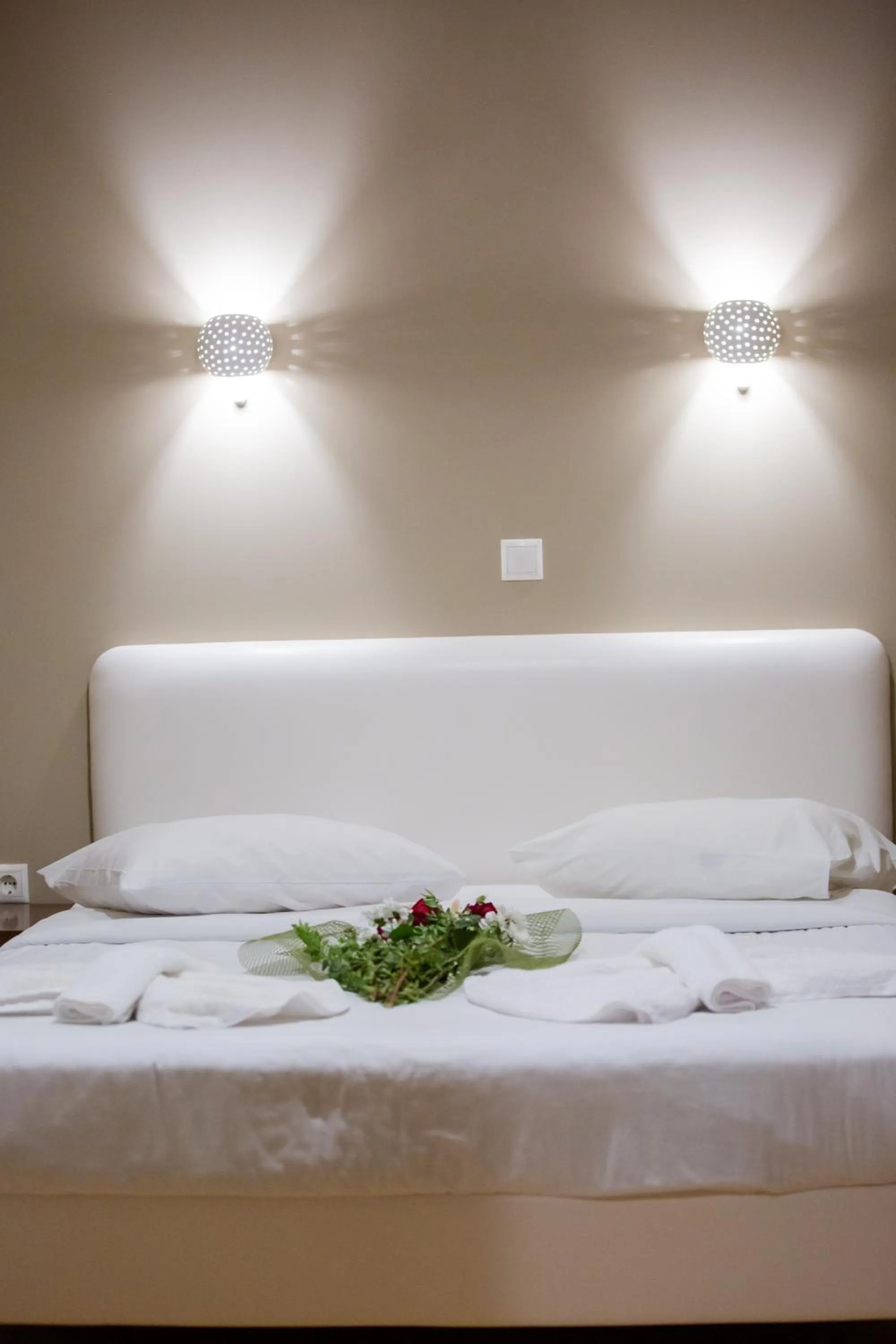 Bed in Cavallari Palace Hotel Suites