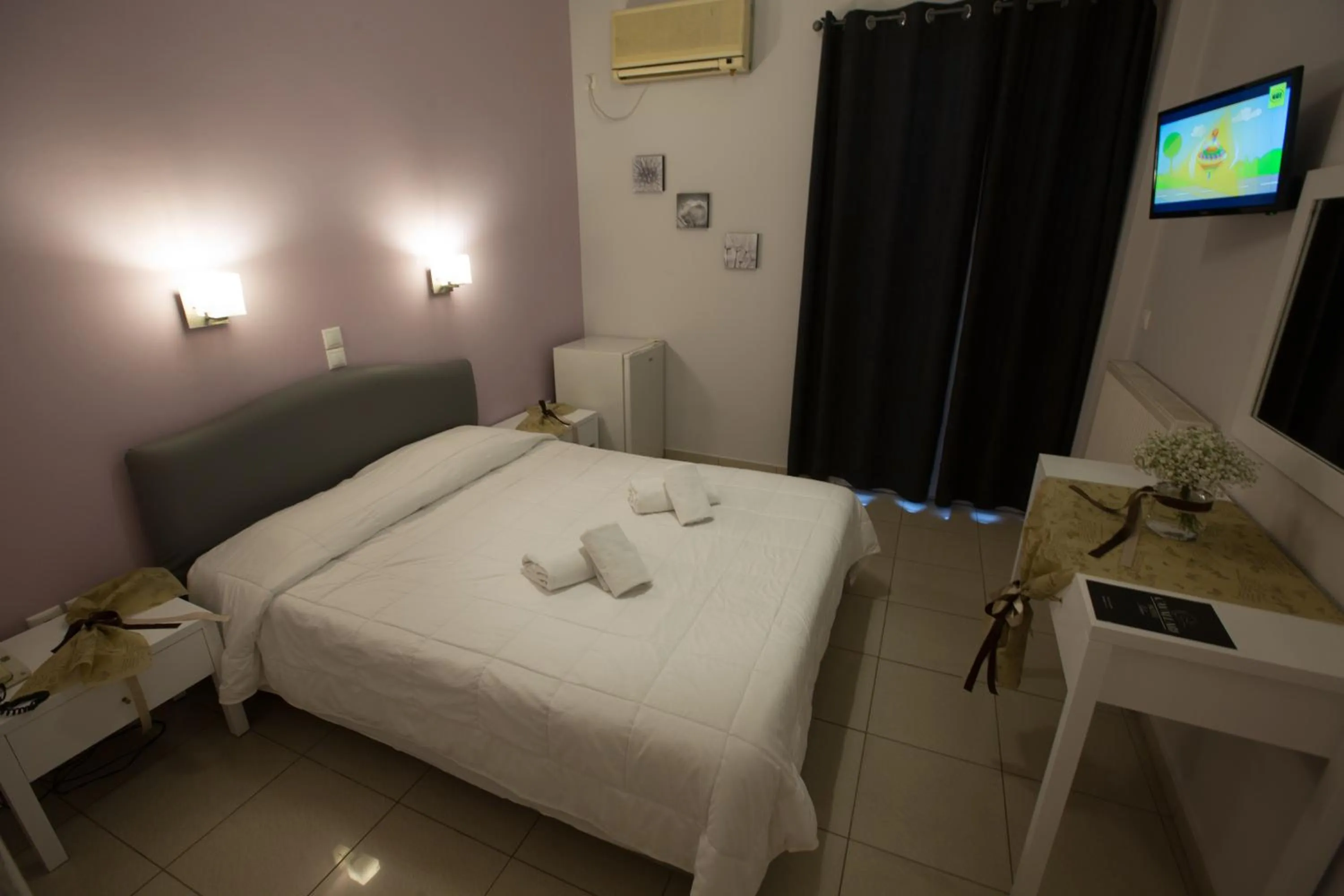 Bed in Cavallari Palace Hotel Suites