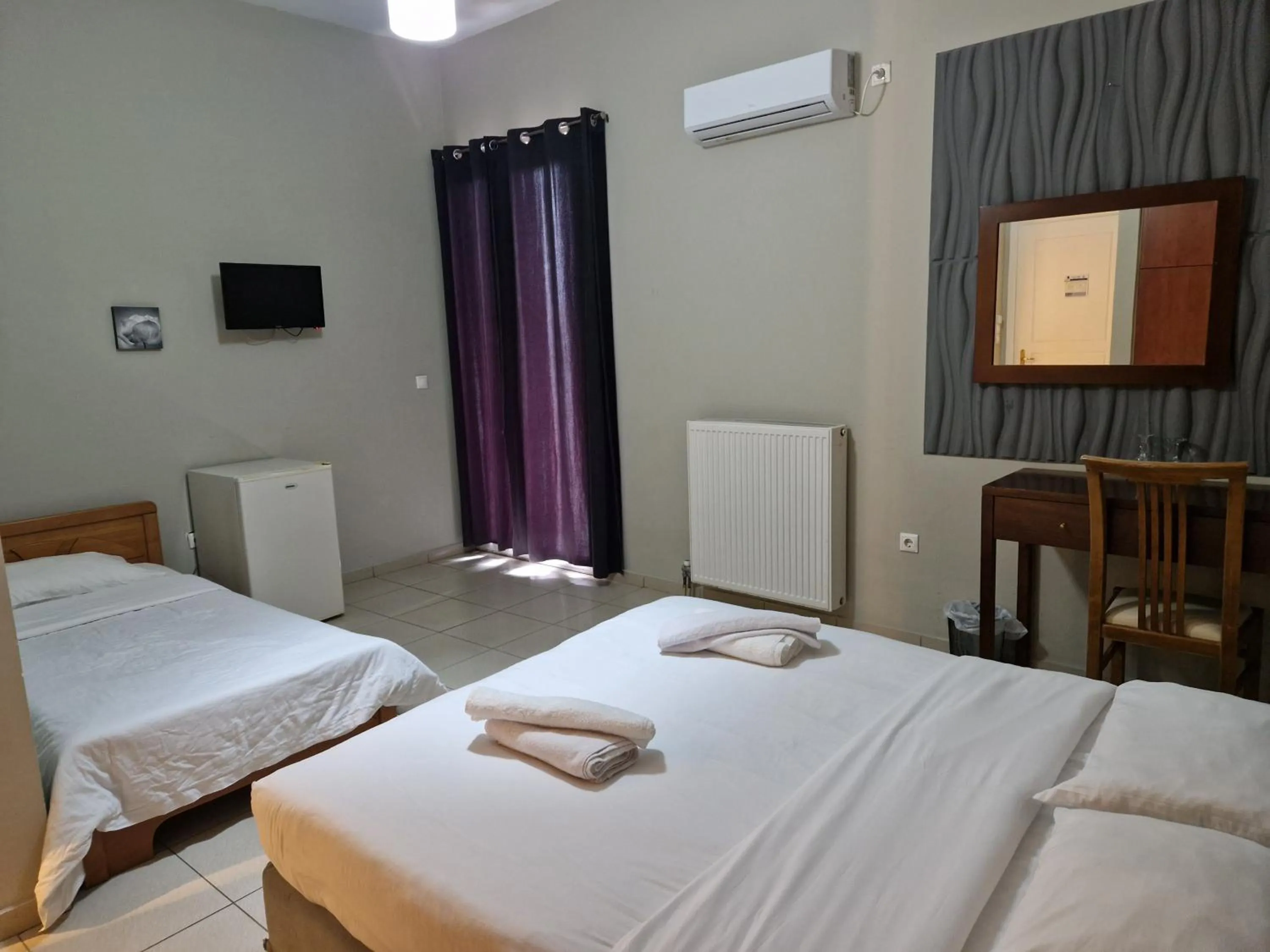 Bed in Cavallari Palace Hotel Suites