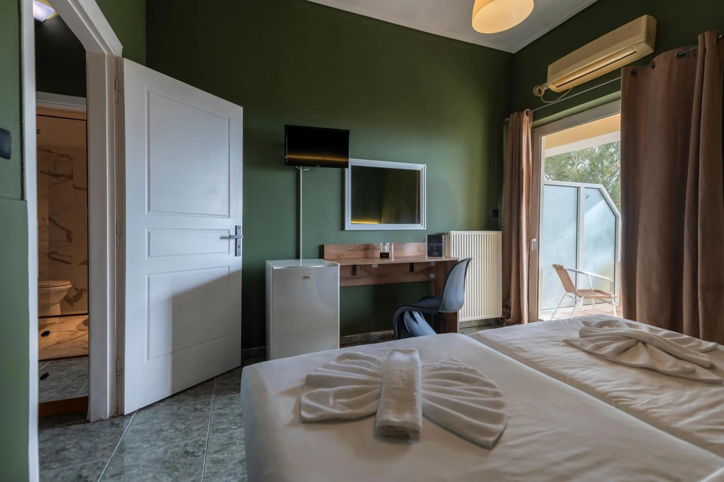 Bed in Cavallari Palace Hotel Suites