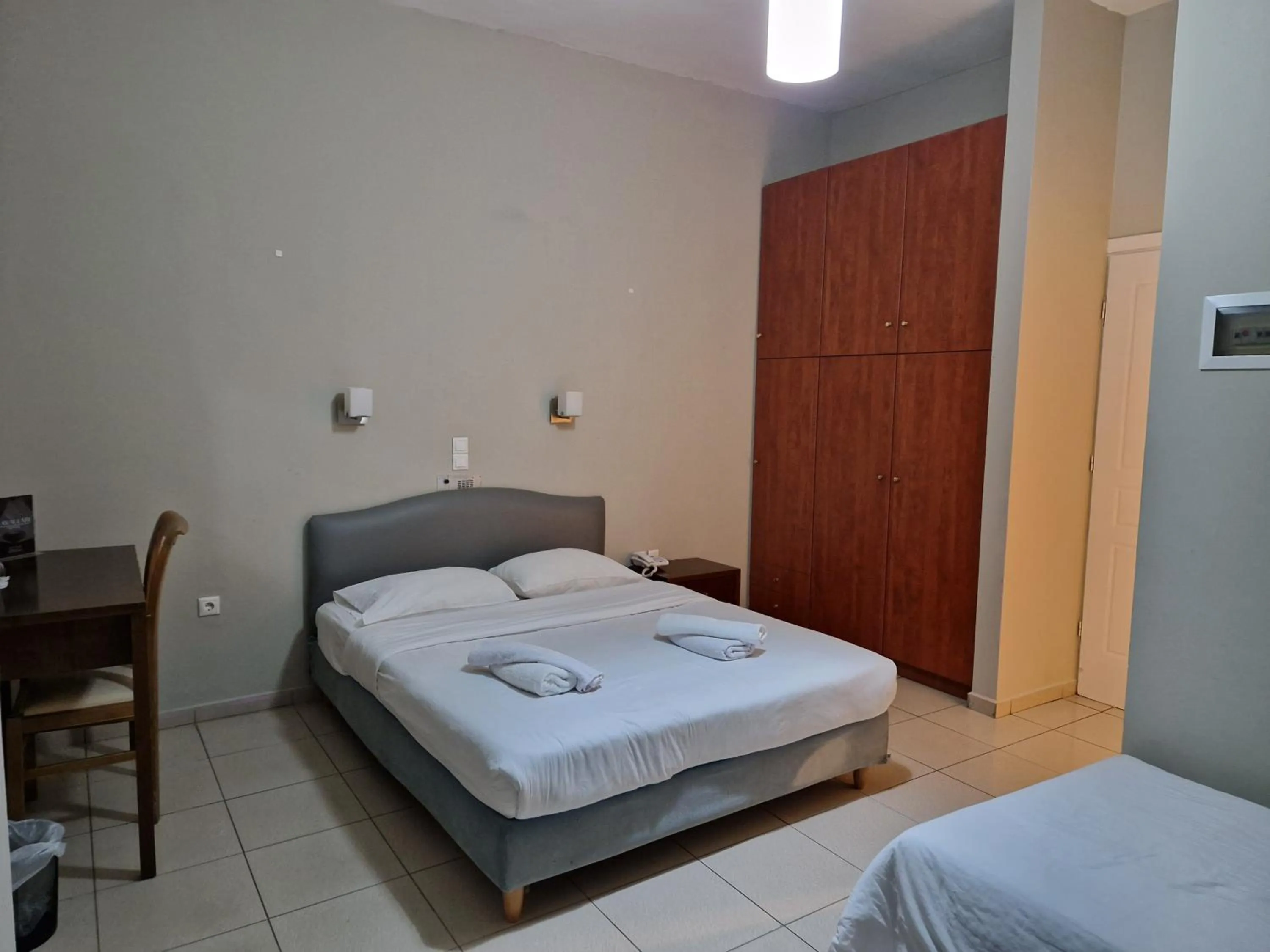 Bed in Cavallari Palace Hotel Suites