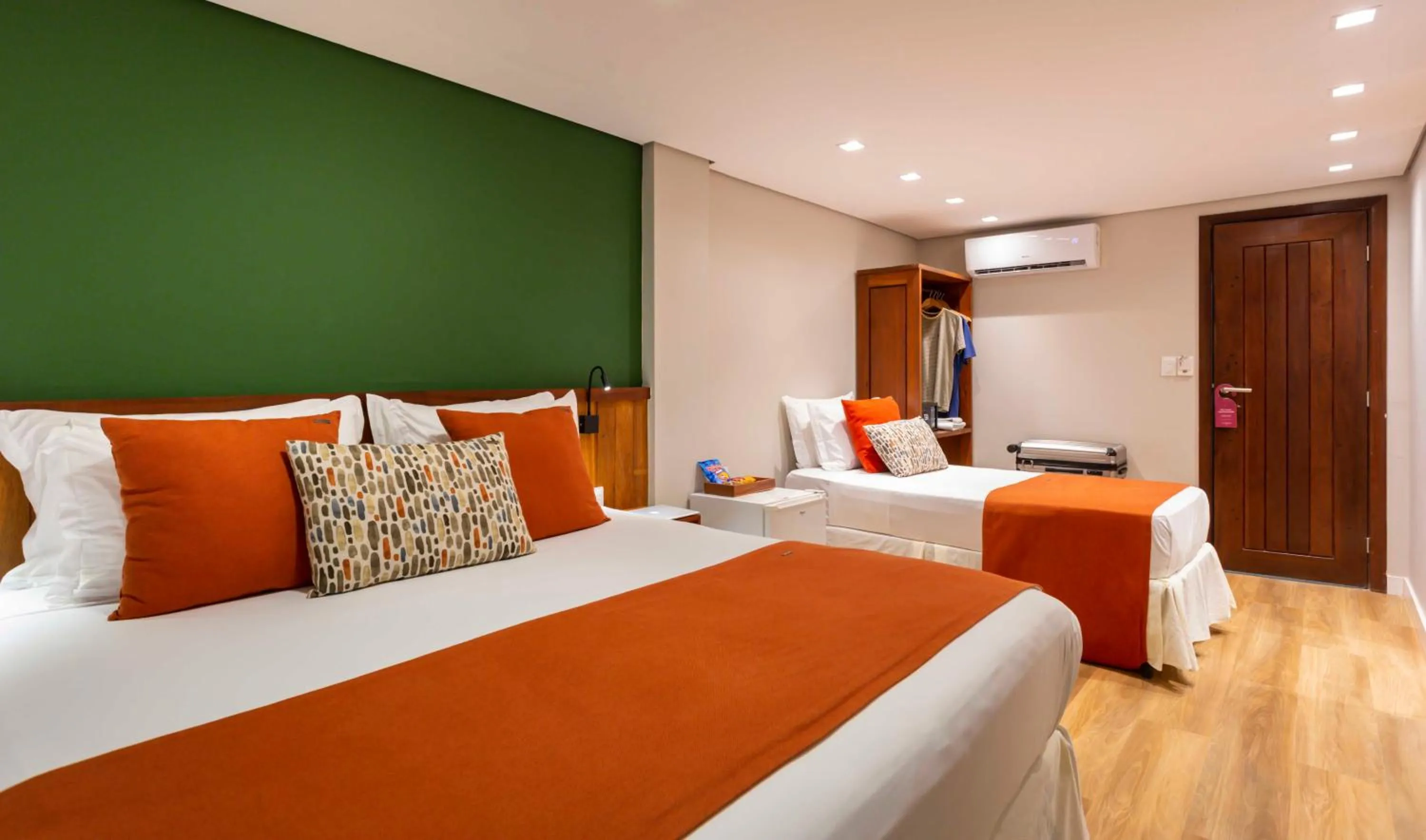 Bed in Pousada Bahia Tambor