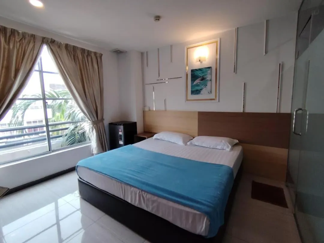 Bed in Dolphin Hotel