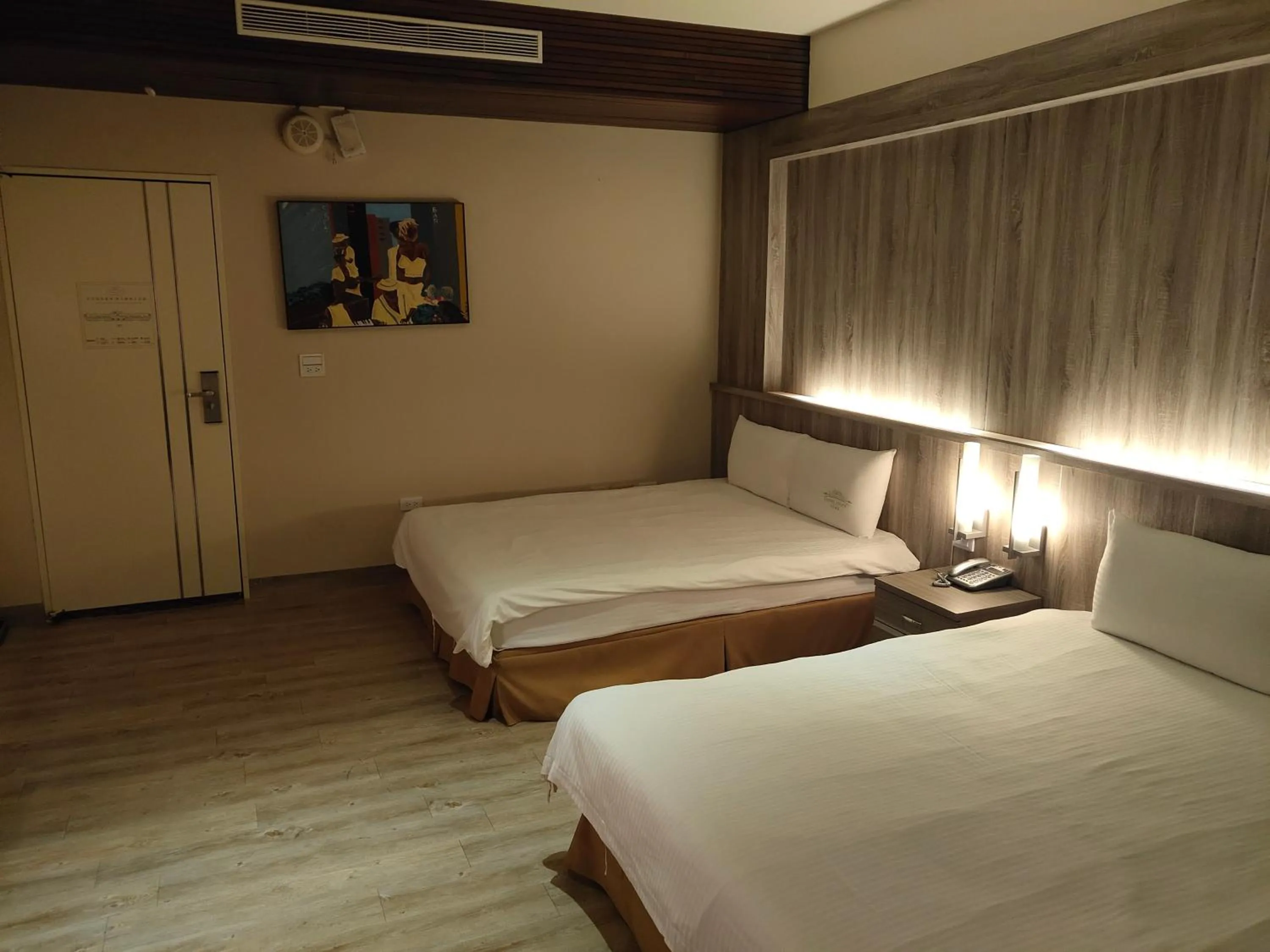 Bed in Empire Pacific Hotel龍潭科學園區 六福村 幼獅工業園區 長租旅居