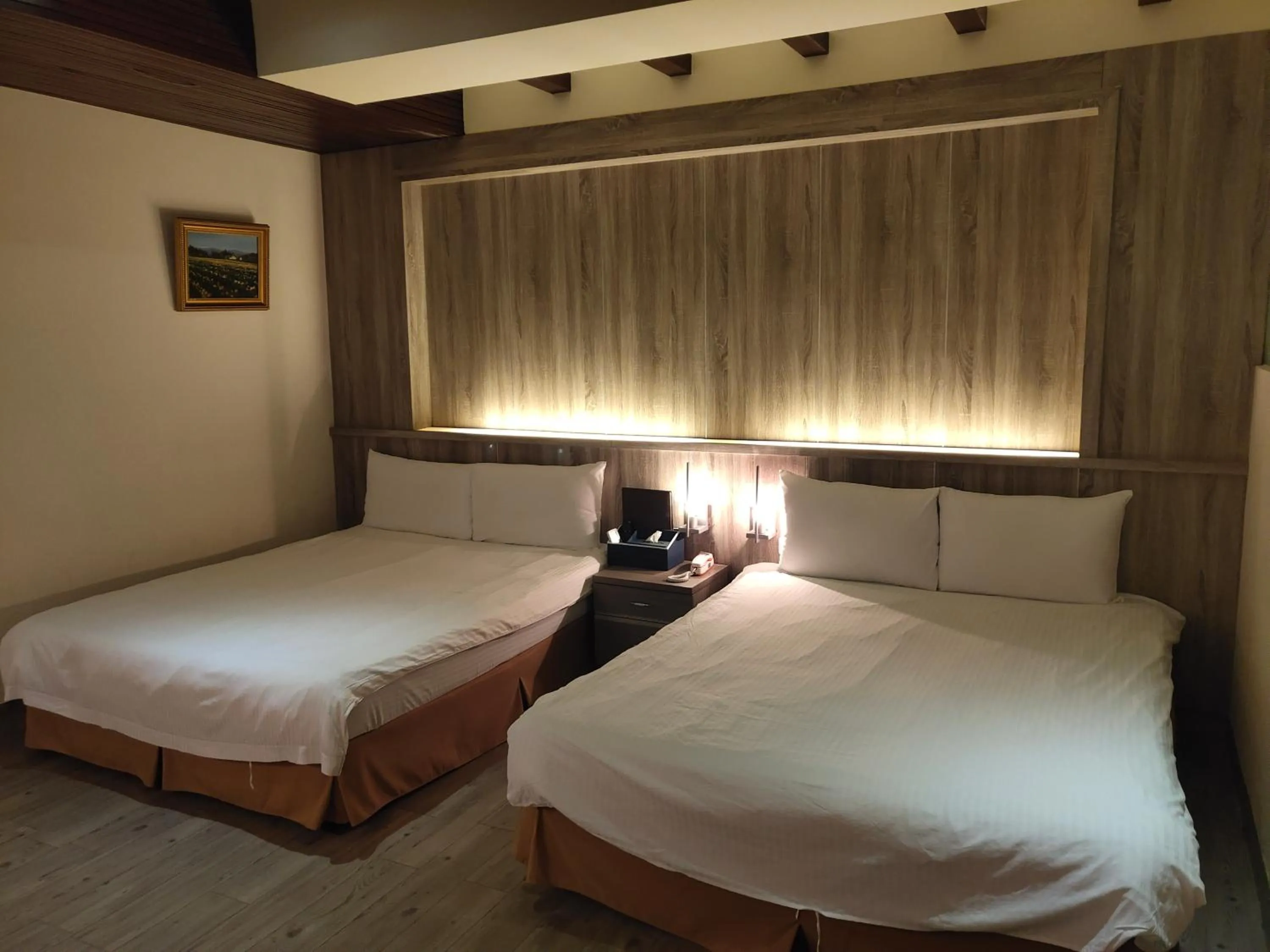 Bed in Empire Pacific Hotel龍潭科學園區 六福村 幼獅工業園區 長租旅居