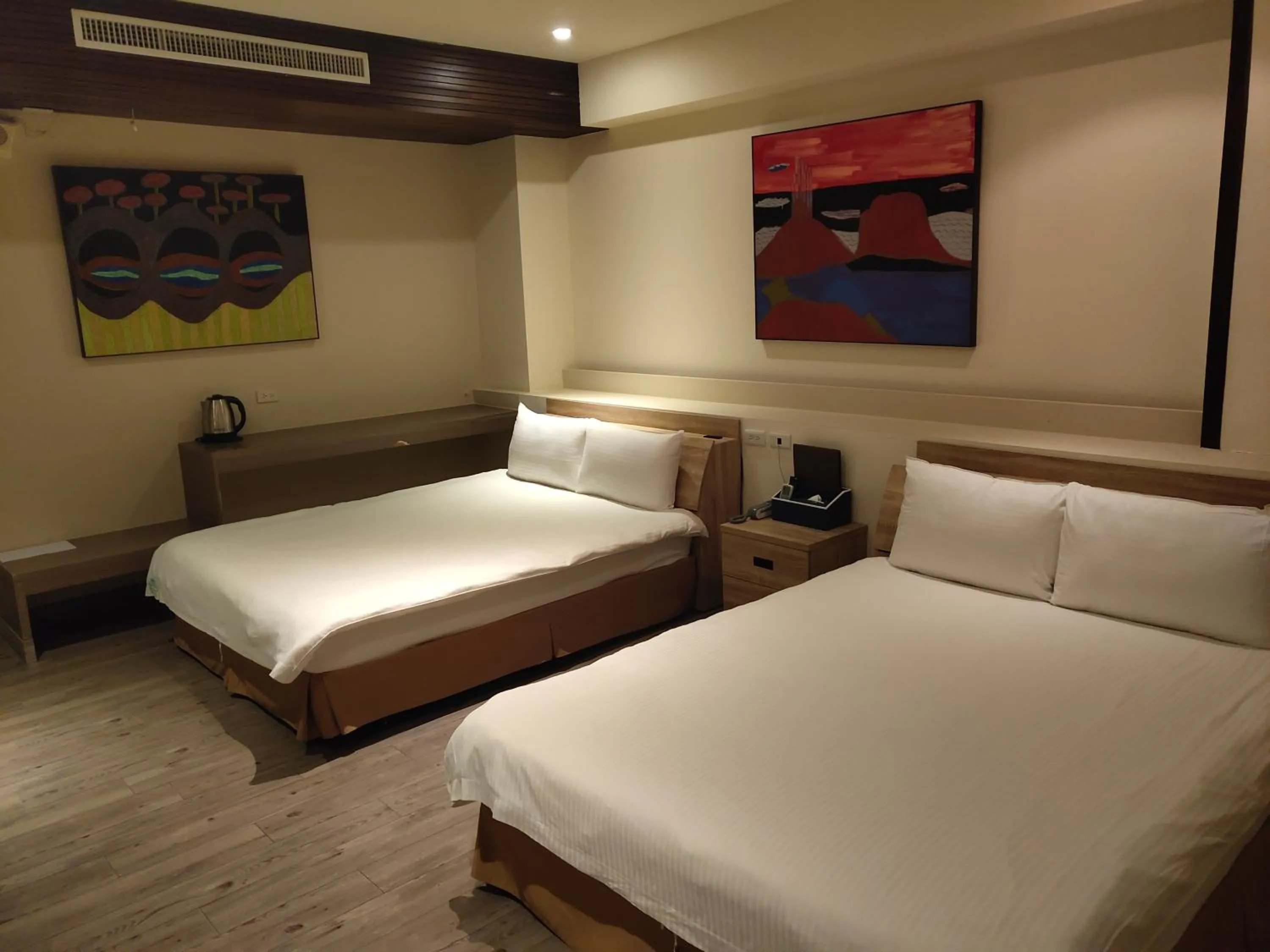 Bed in Empire Pacific Hotel龍潭科學園區 六福村 幼獅工業園區 長租旅居