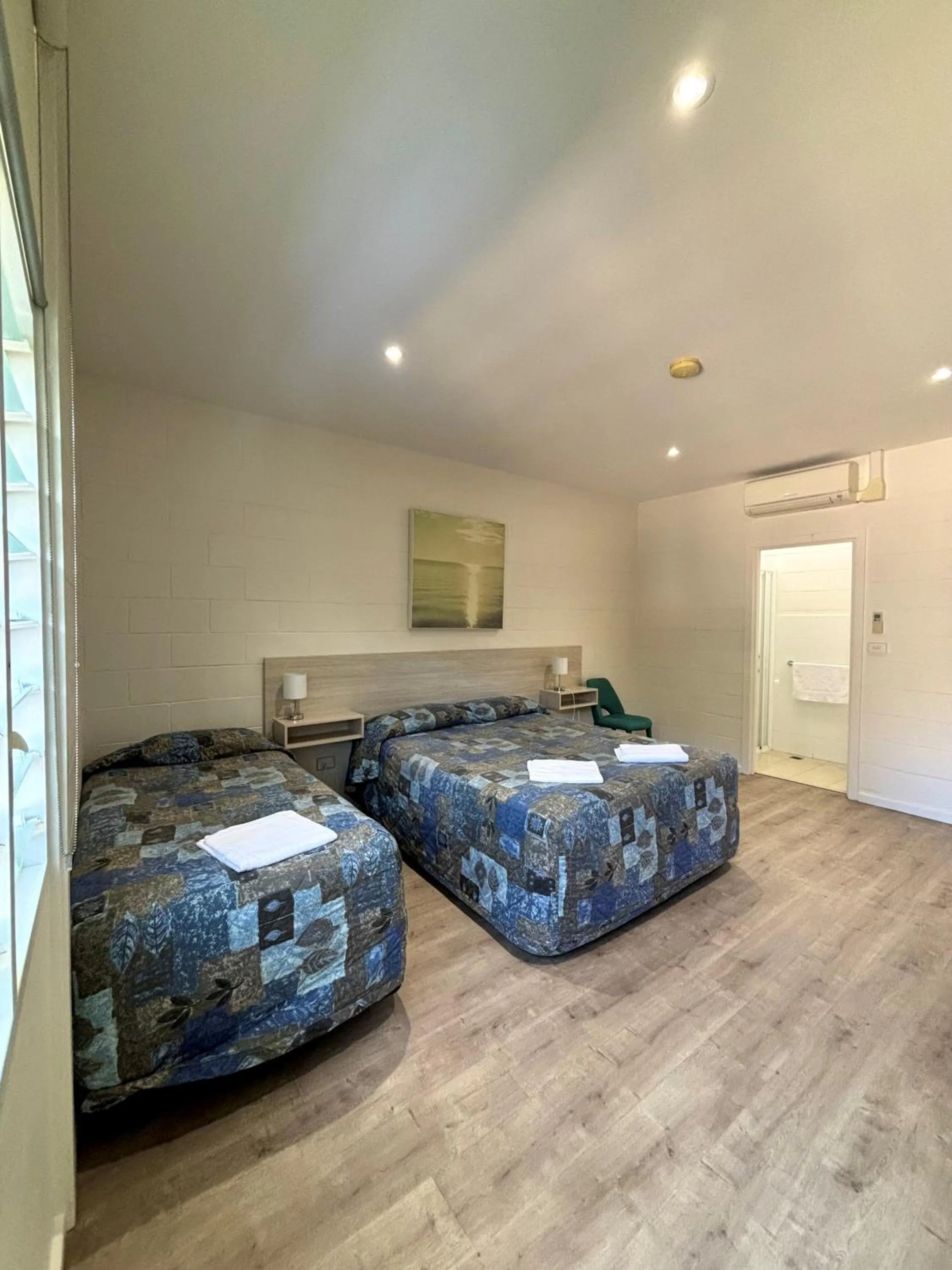 Bed in Time and Tide Hotel Motel