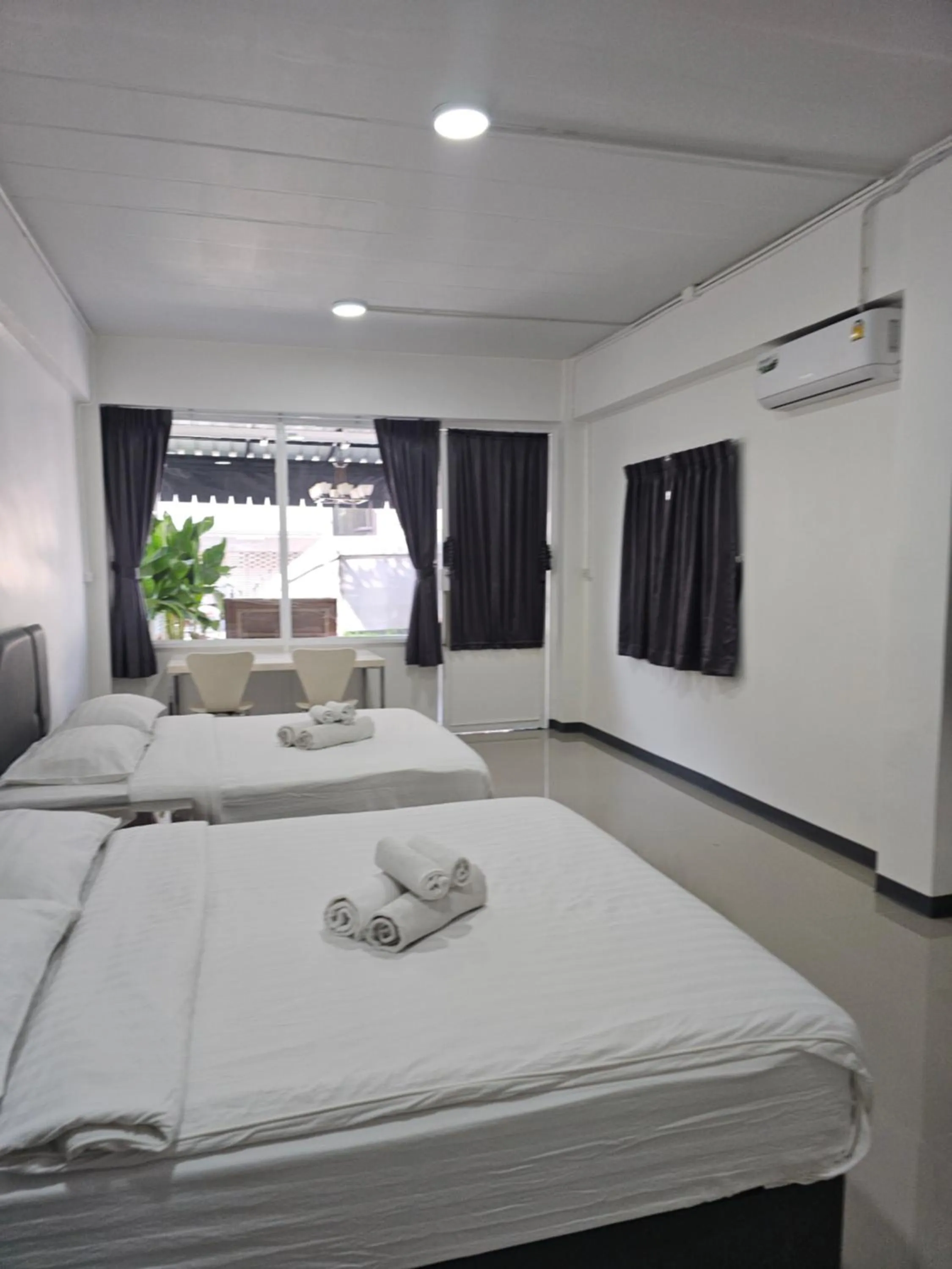 Bed in Loft 21 Apartment Romklao