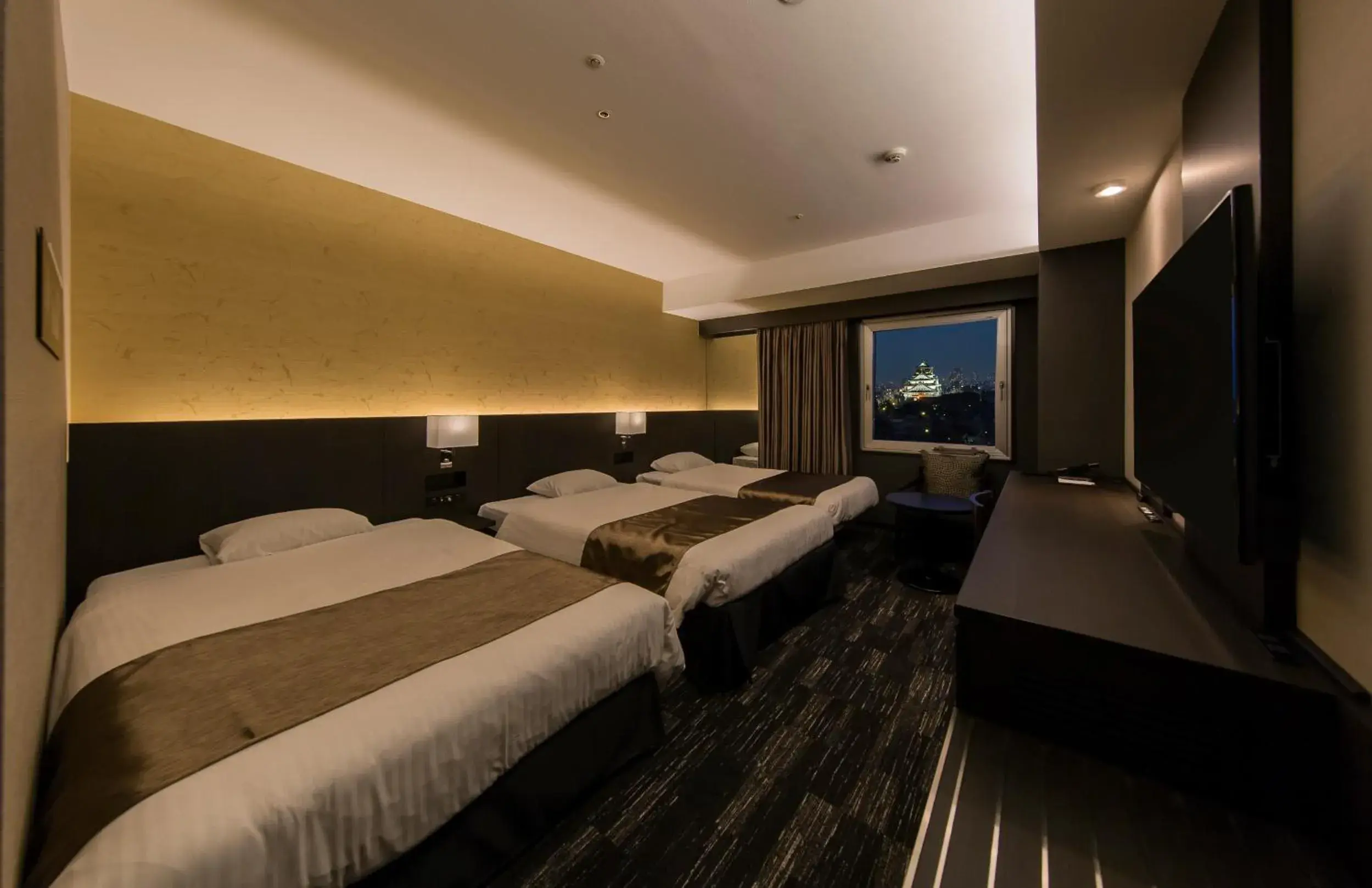 Bed in KKR Hotel Osaka Bed in KKR Hotel Osaka