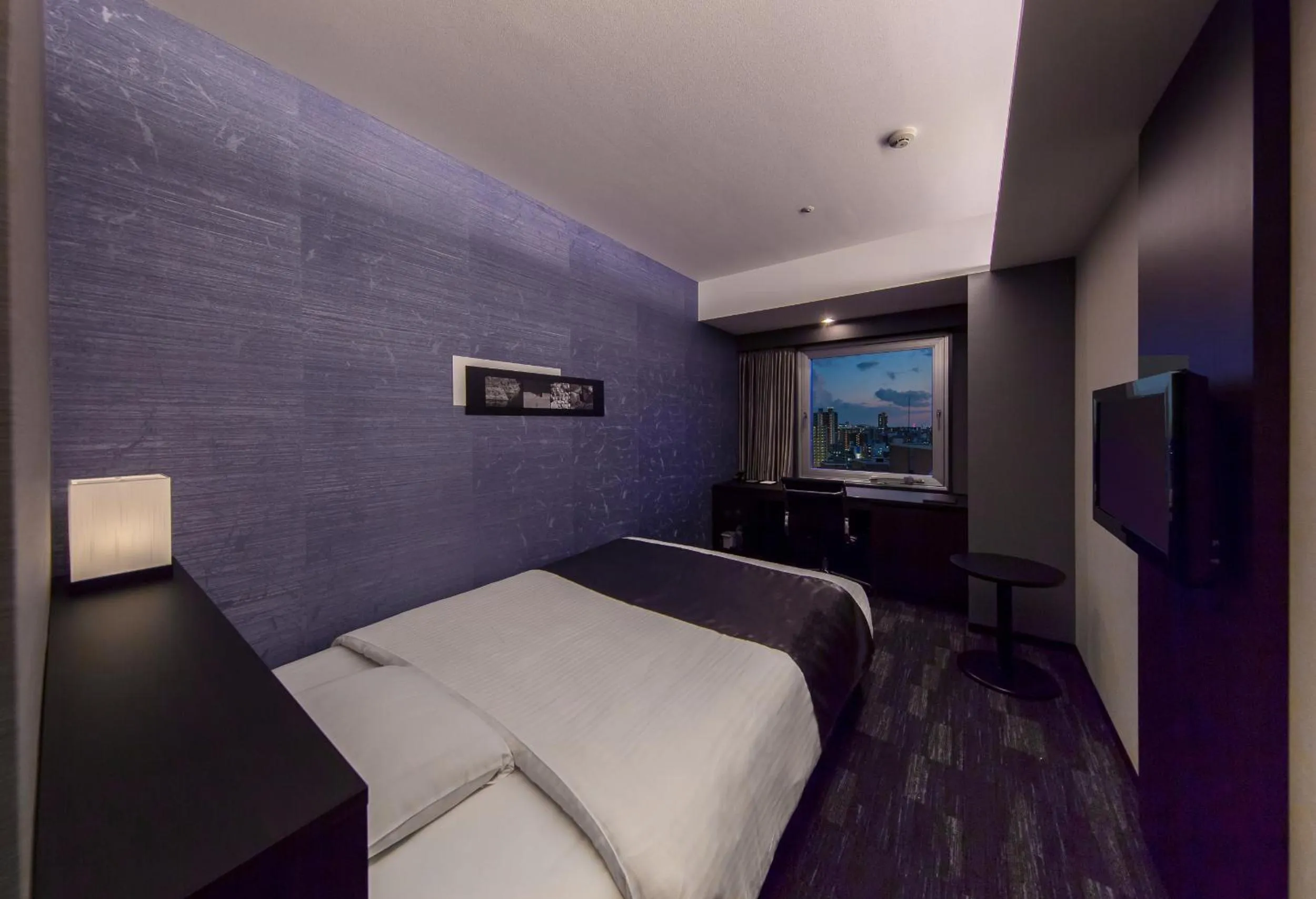 Bed in KKR Hotel Osaka