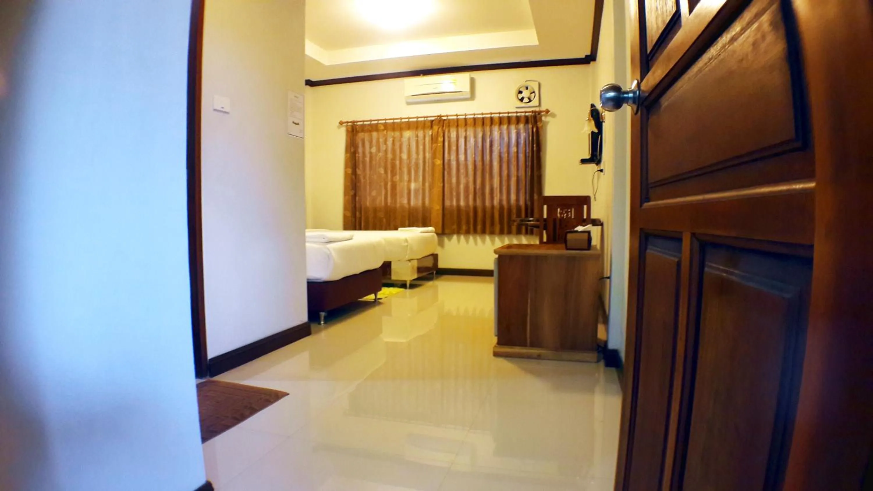 Bed in Khum Nakhon Hotel