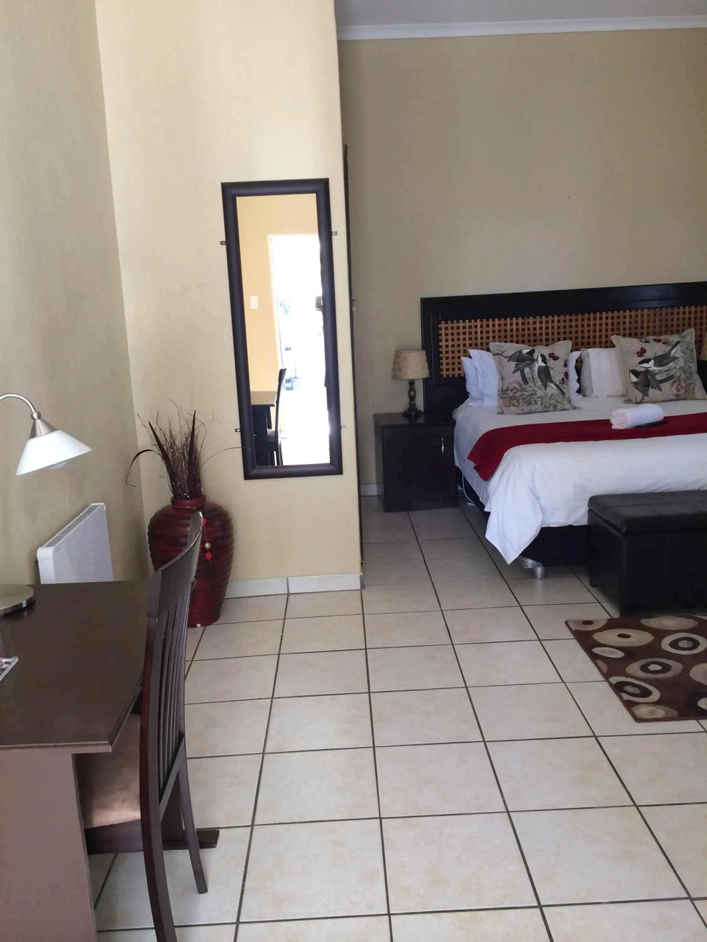 Bedroom, Bed in Mcbest Guest House