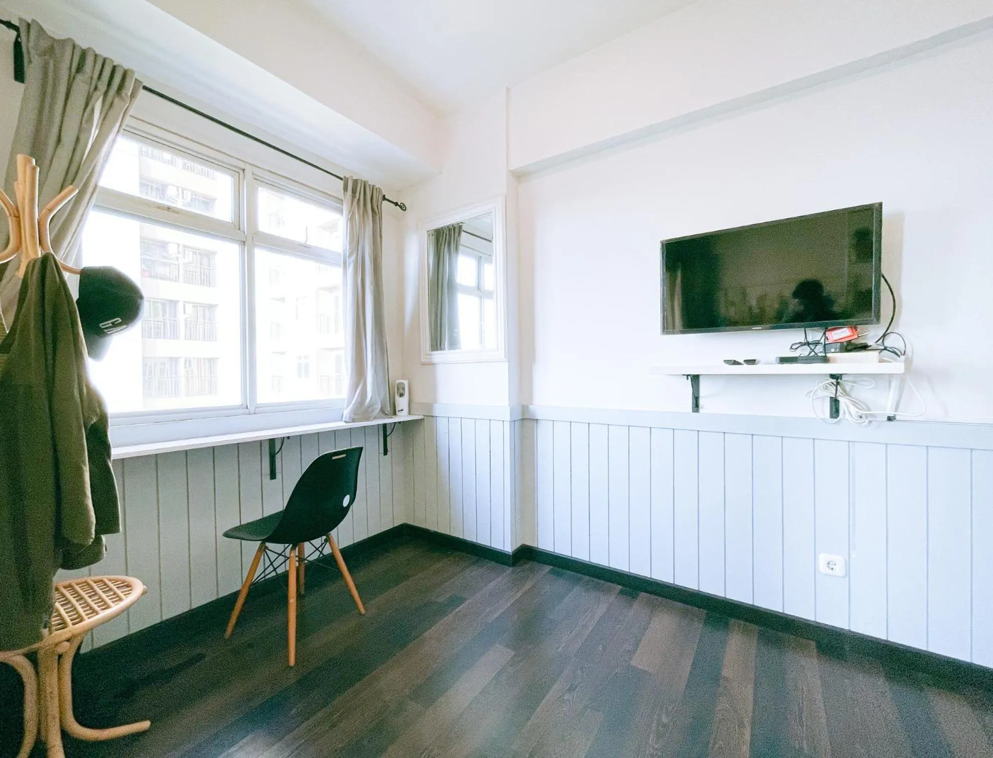 TV and multimedia in The Satu Stay - Apartemen SGV