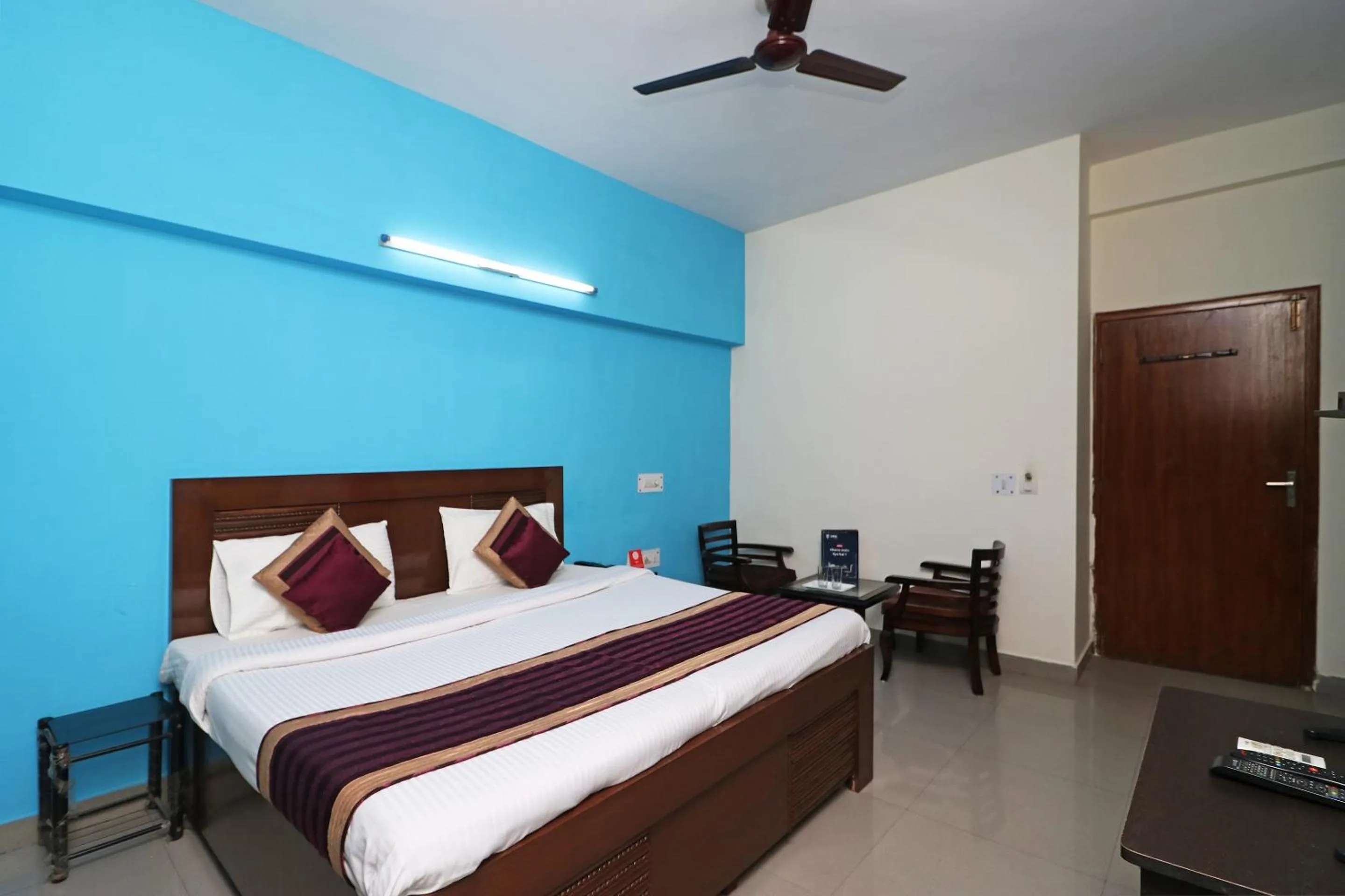 Bed in Hotel Akash Palace