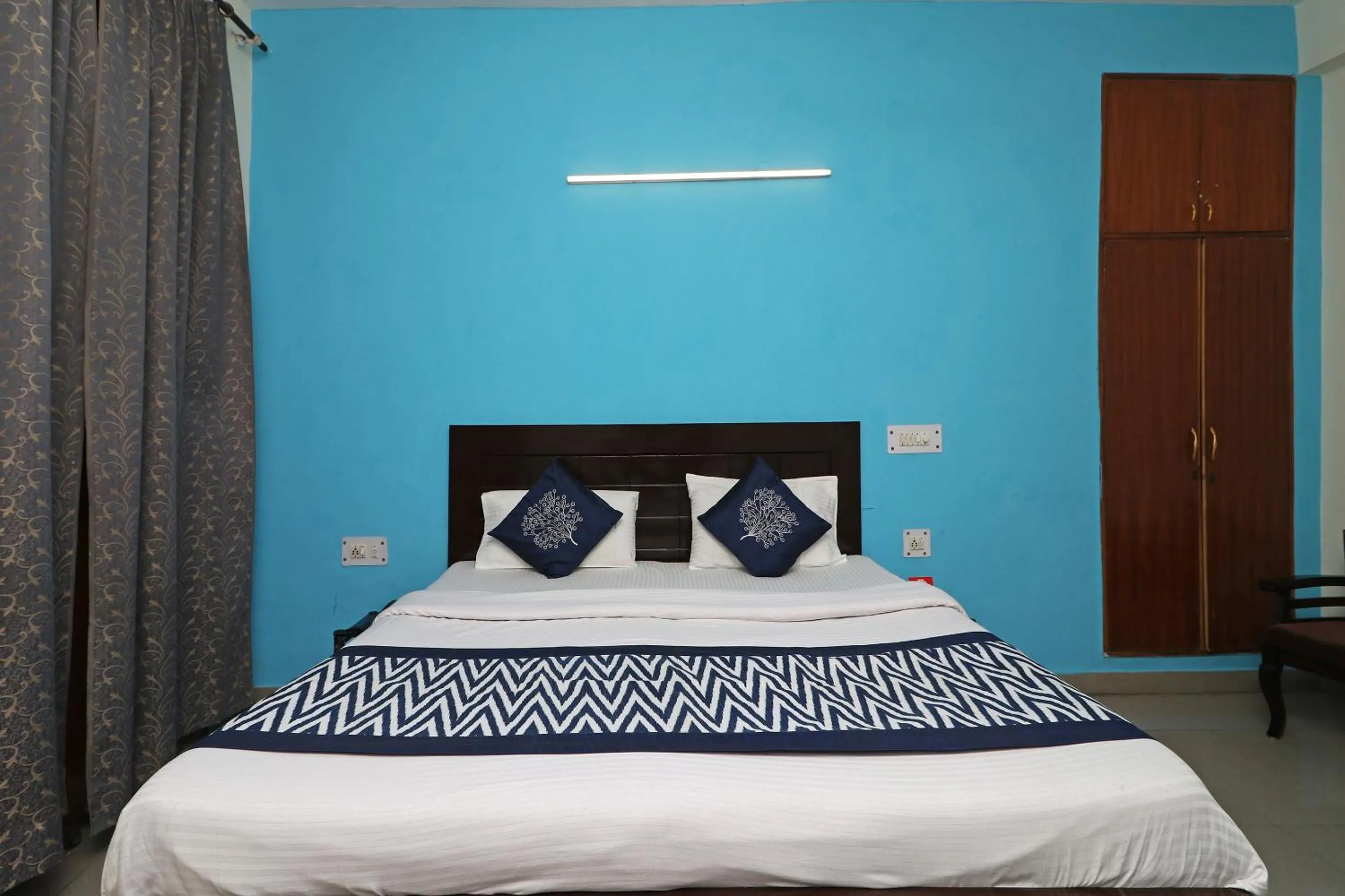 Bed in Hotel Akash Palace